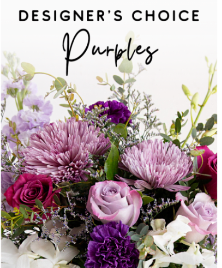Designers Choice Purple Tones - Vase Bouquet - Surprise them with a stunning hand-designed arrangement full of fresh, purple blooms! Our expert designers will hand pick fresh floral in purple hues to create a one-of-a-kind custom arrangement.