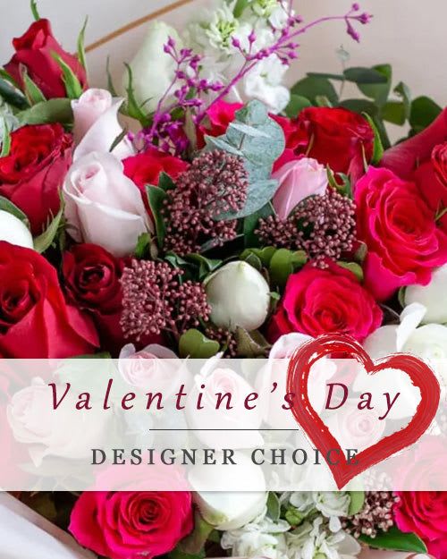 Valentines Day Designers Choice - Wrapped Bouquet  - Designer choice of Valentine colors, beautifully gift wrapped for your special someone.  Vase is not included.  Please note the picture shown on the left are for references only. Flowers used are based on weekly availability and may not be exactly as shown; but don't worry, we will make sure it is beautiful.