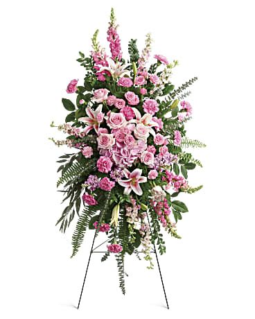 Glorious Farewell Spray - This glorious spray of pink hydrangea, roses and lilies is an especially fond, feminine farewell to one deeply loved. This glorious spray includes pink hydrangea, light pink roses, light pink spray roses, pink oriental lilies, pink carnations, miniature light pink carnations, pink larkspur, pink snapdragons, pink stock, huckleberry, sword fern, asparagus plumosus and greenery. Delivered on a wire easel. Approximately 29" W x 53" H