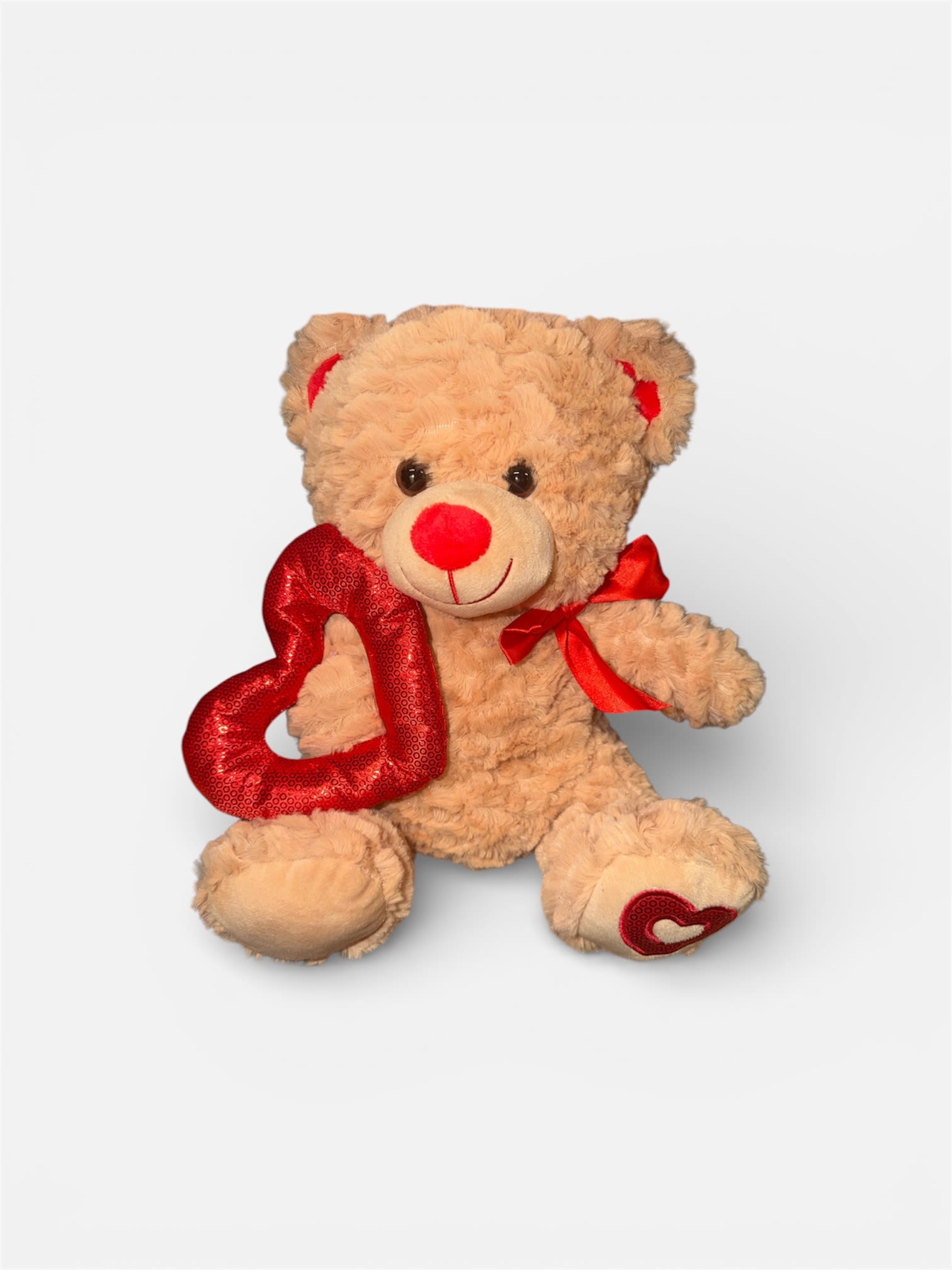 Hold My Heart Bear - Let your love hold your heart this Valentines Day by giving her this soft and adorable plushy bear.   *Approximate Height 12"*
