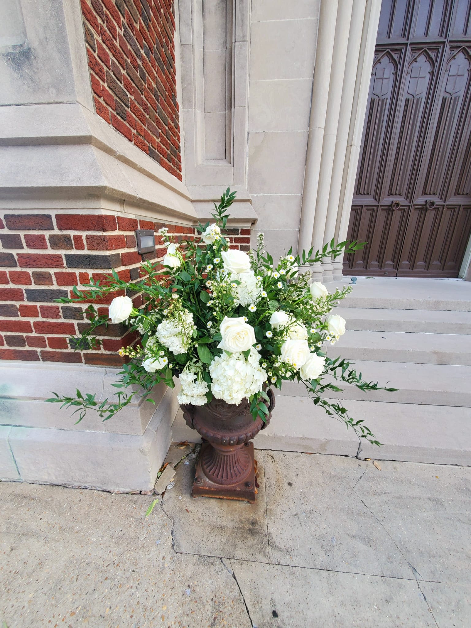 Grace - An all white lovely flower arrangement, perfect for a sympathy occasion.