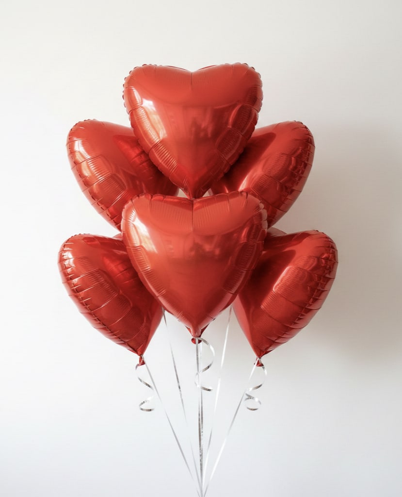 Red Hearts. - Half dozen red heart shaped mylar balloons.