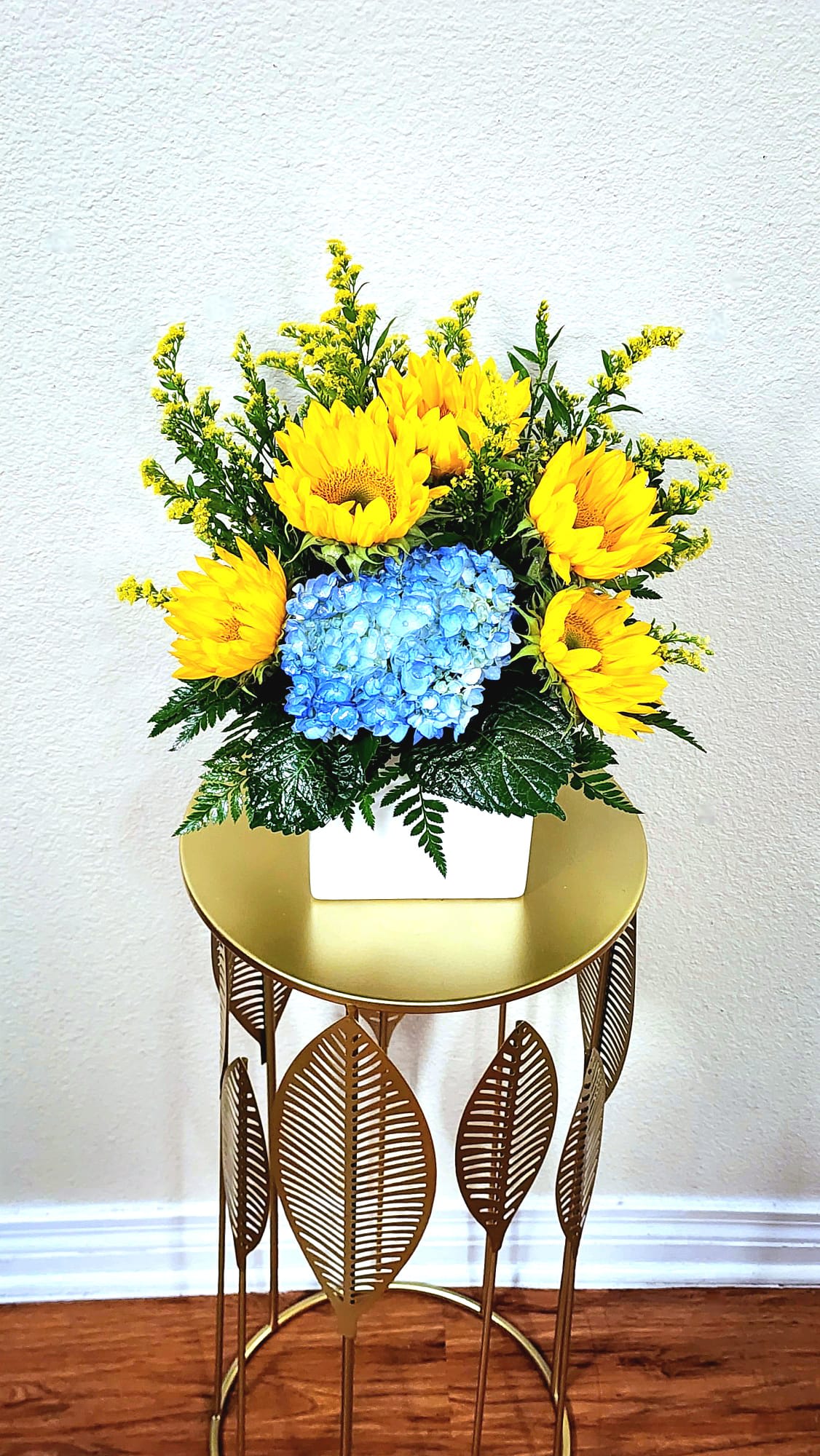 Sunny Day - Blue hydrangeas, solidago, leather leaf and sunflowers? Sounds like the perfect weather.