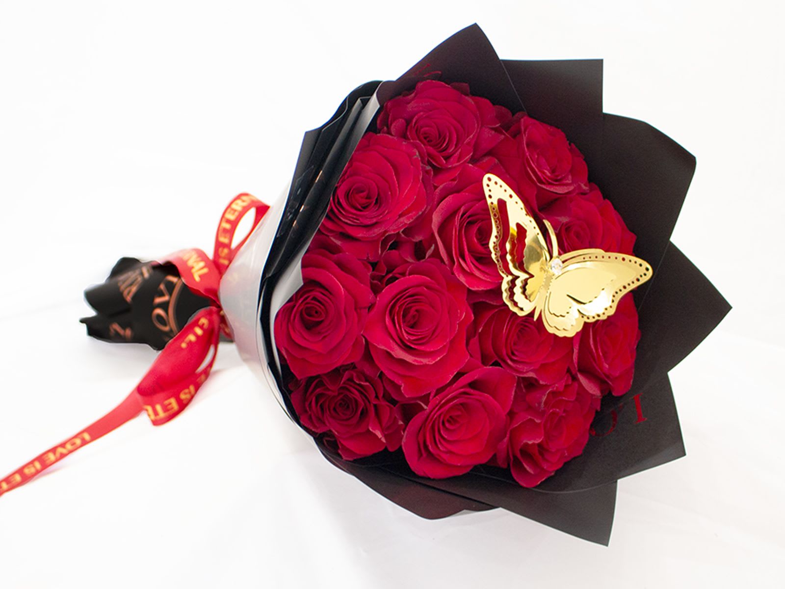 13 Roses Ramo Buchon with Butterflies - Our hand-tied bouquets are delicately arranged combining pure Ecuadorian roses top with butterflies! 