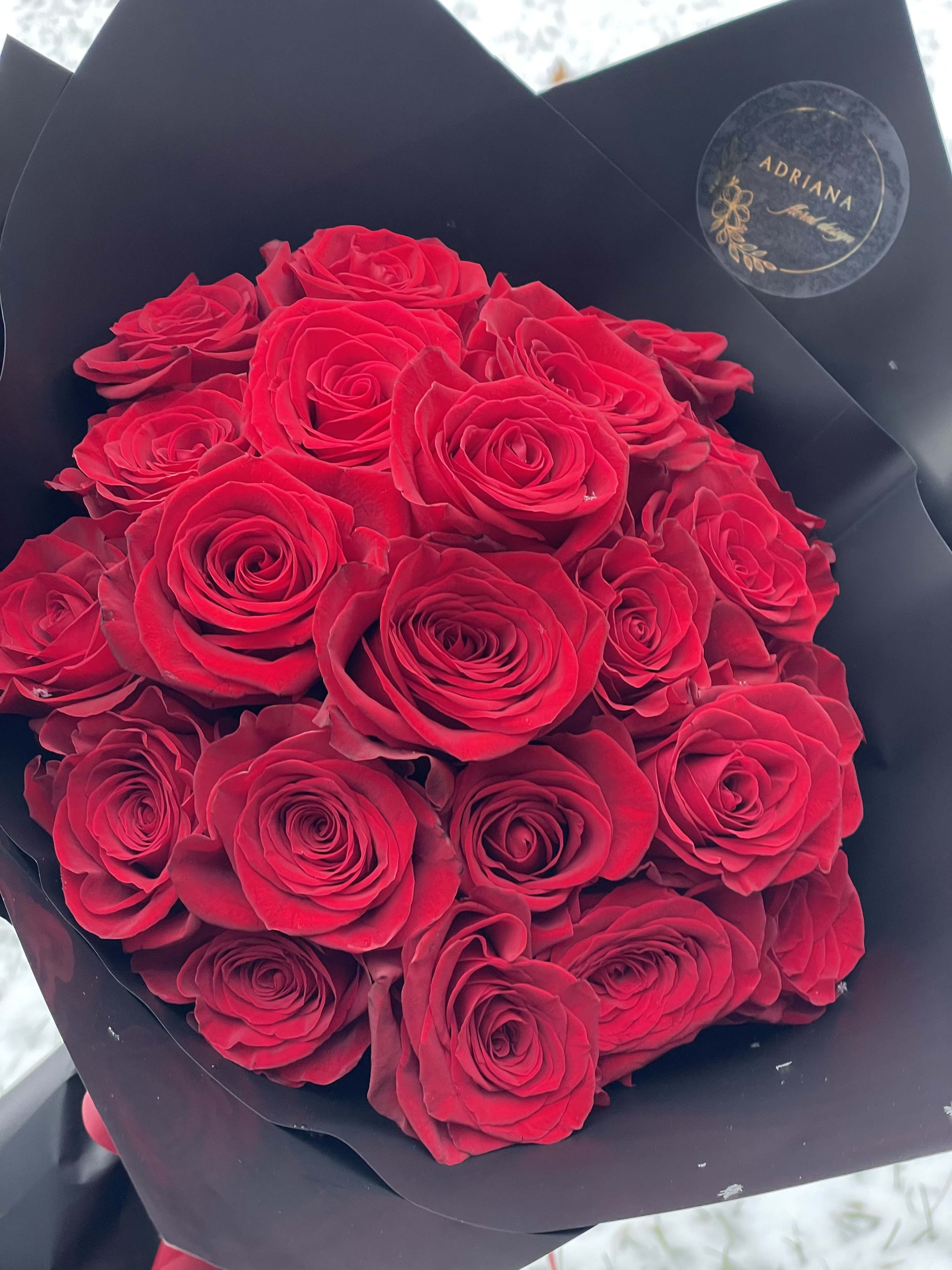 Be Mine - Red Roses in a hand tied bouquet.