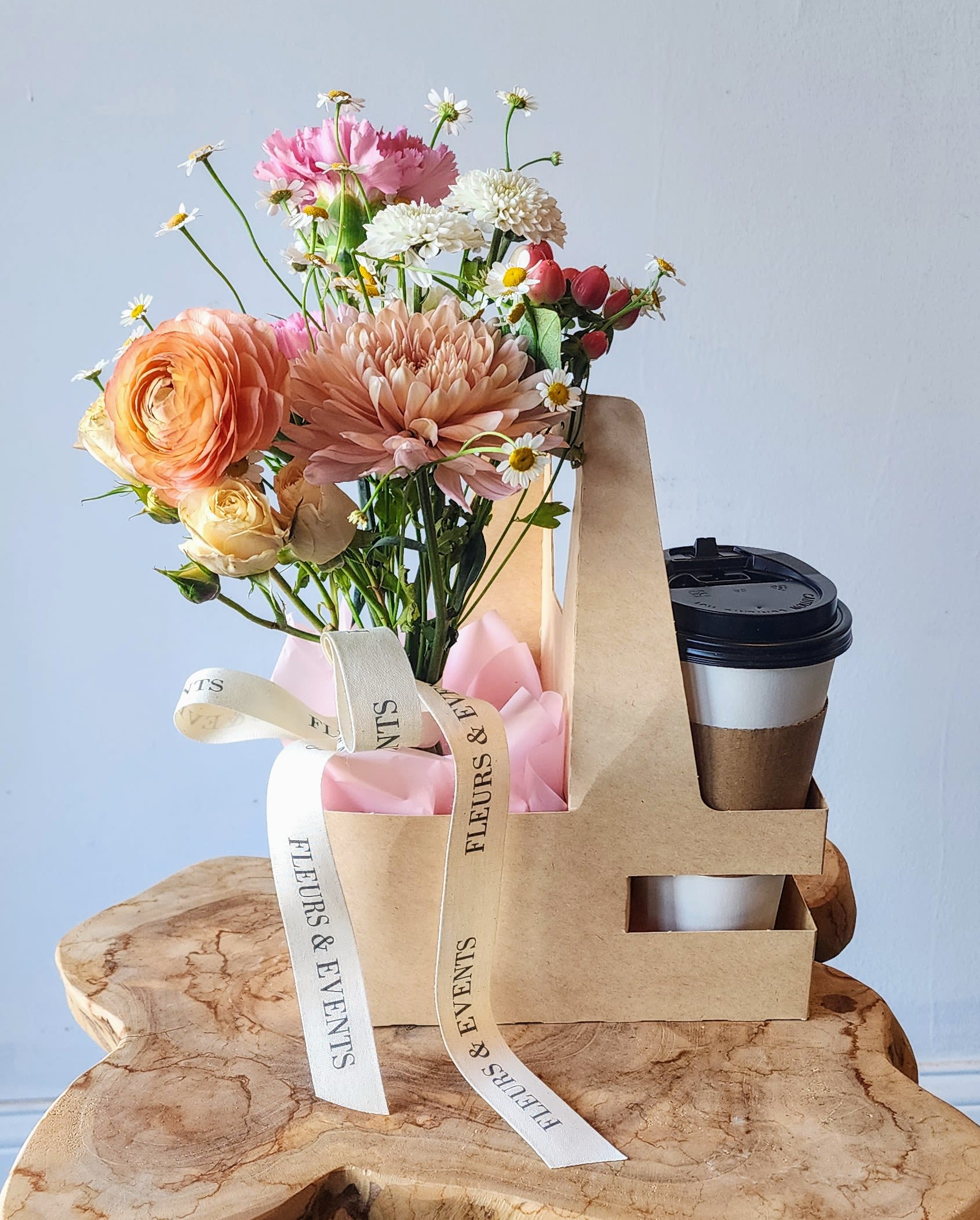 Strawberry Matcha Latte + Posy Wrap - This Valentine’s Day, treat yourself (or someone you love) to a cozy strawberry matcha latte paired with a romantic posy. The flowers are thoughtfully wrapped and nestled alongside your drink in a convenient travel box—ready to gift and perfect for enjoying on the go. Sweet, simple, and full of love—because flowers and a good sip are always a good idea.  Includes a 12oz hot or 16oz iced strawberry matcha. Please specify your choice during checkout.  Valentine’s Day preorder required. Pickup only at this time. Limited availability.