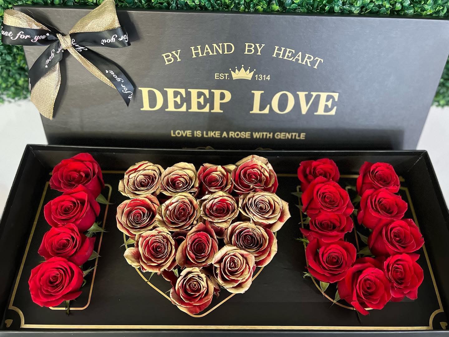 I heart U box  - Box that spells out I heart U, filled in with red and gold roses. Makes the perfect romantic gift. Box color may vary due to availability. Dimensions: 24"L X 10"W X 4" H. 