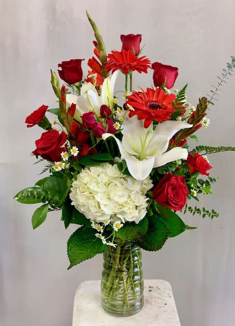 Be Mine Everyday  - Traditional vase arrangement of mixed flowers of Red Roses, Hydrangea, Lily, Gladiolus Carnations, Spray Roses, Gerbera Daisy.  The perfect red and white combo for the holiday!  