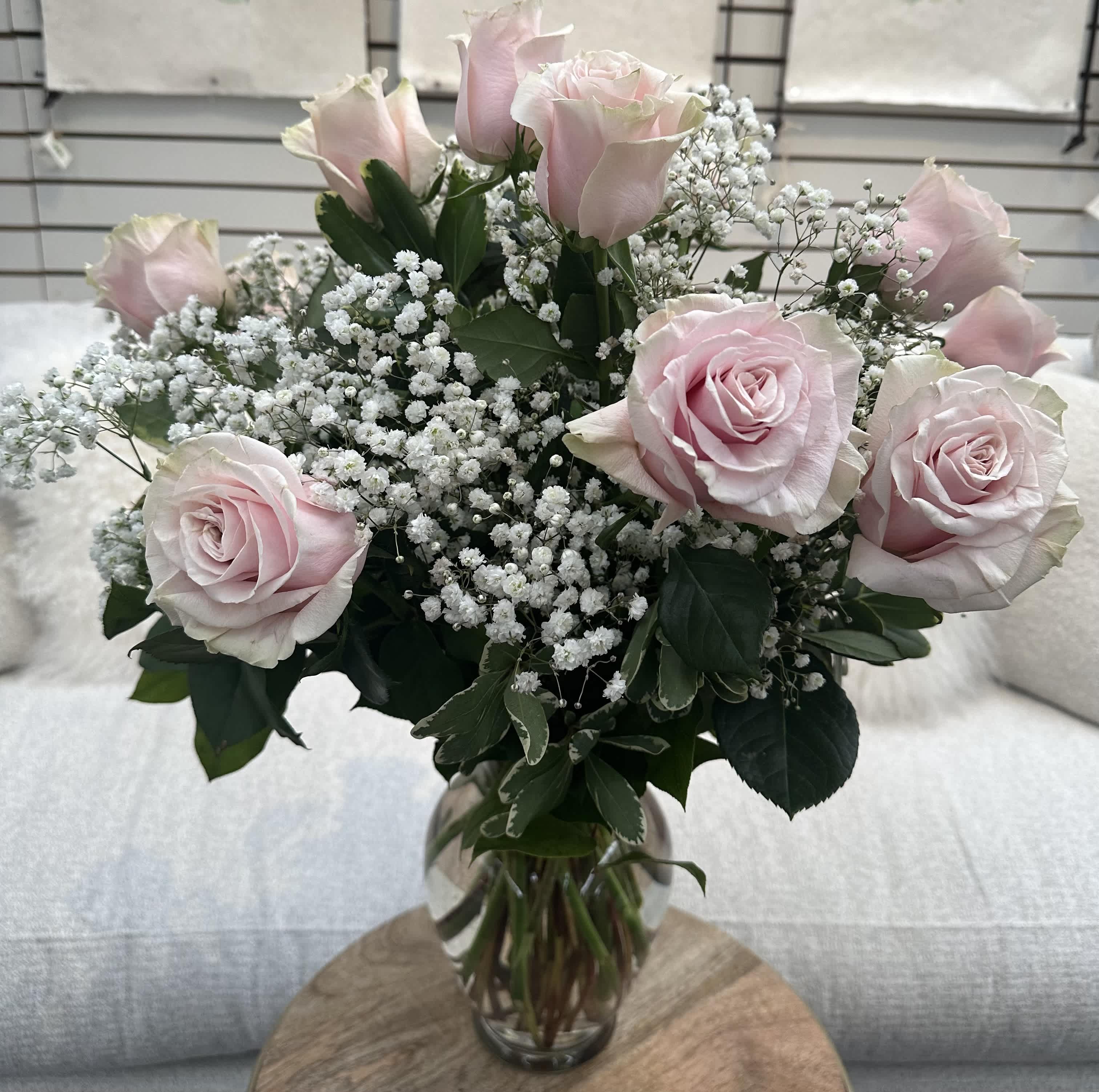 Light Pink Dozen Roses in Vase - Light pink roses with baby's breath and greens
