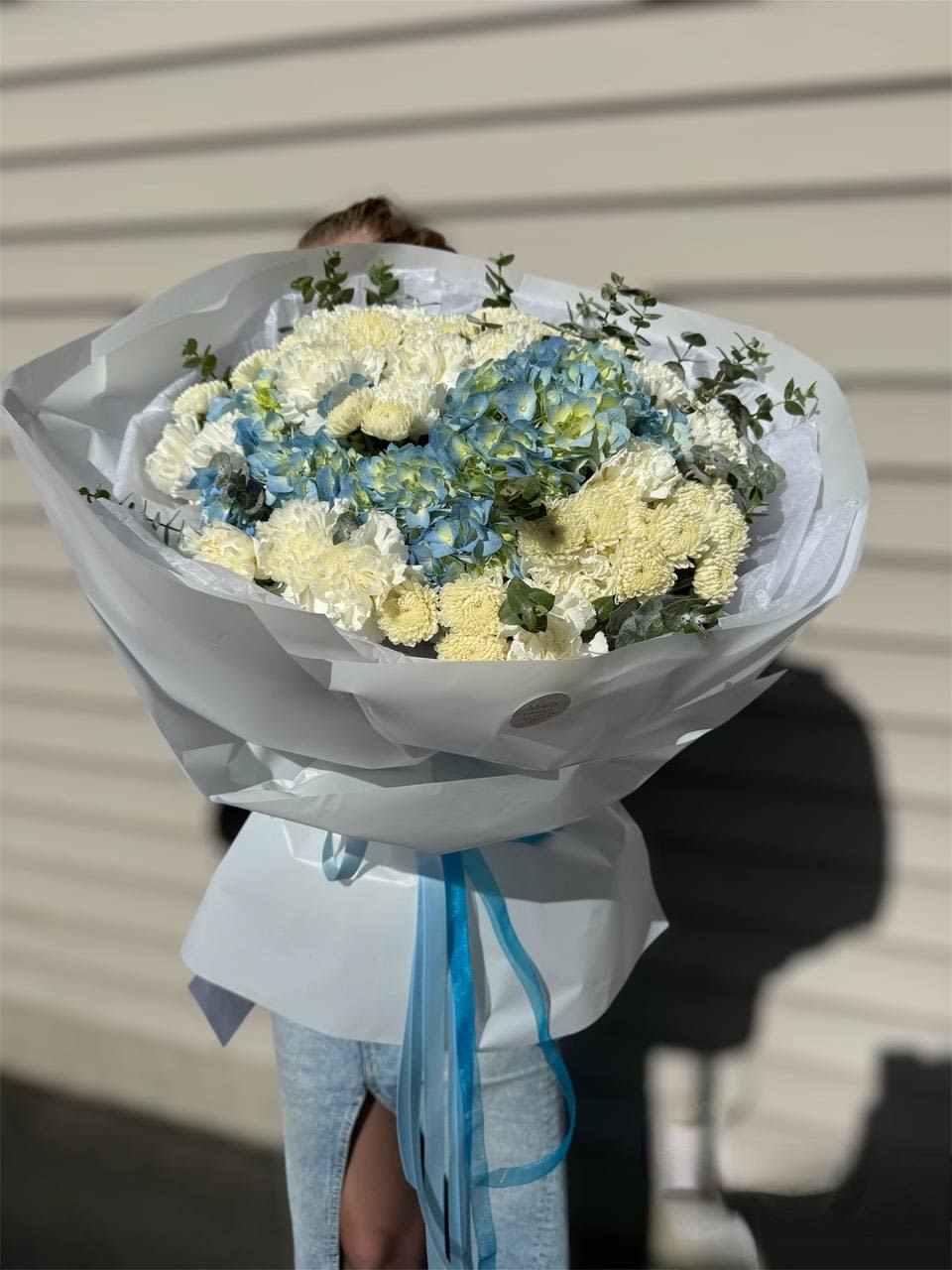 An inexpensive bouquet when you want to please your loved one.  - An inexpensive bouquet when you want to please your loved one. Blue hydrangeas, chrysanthemum, dianthus and eucalyptus. 