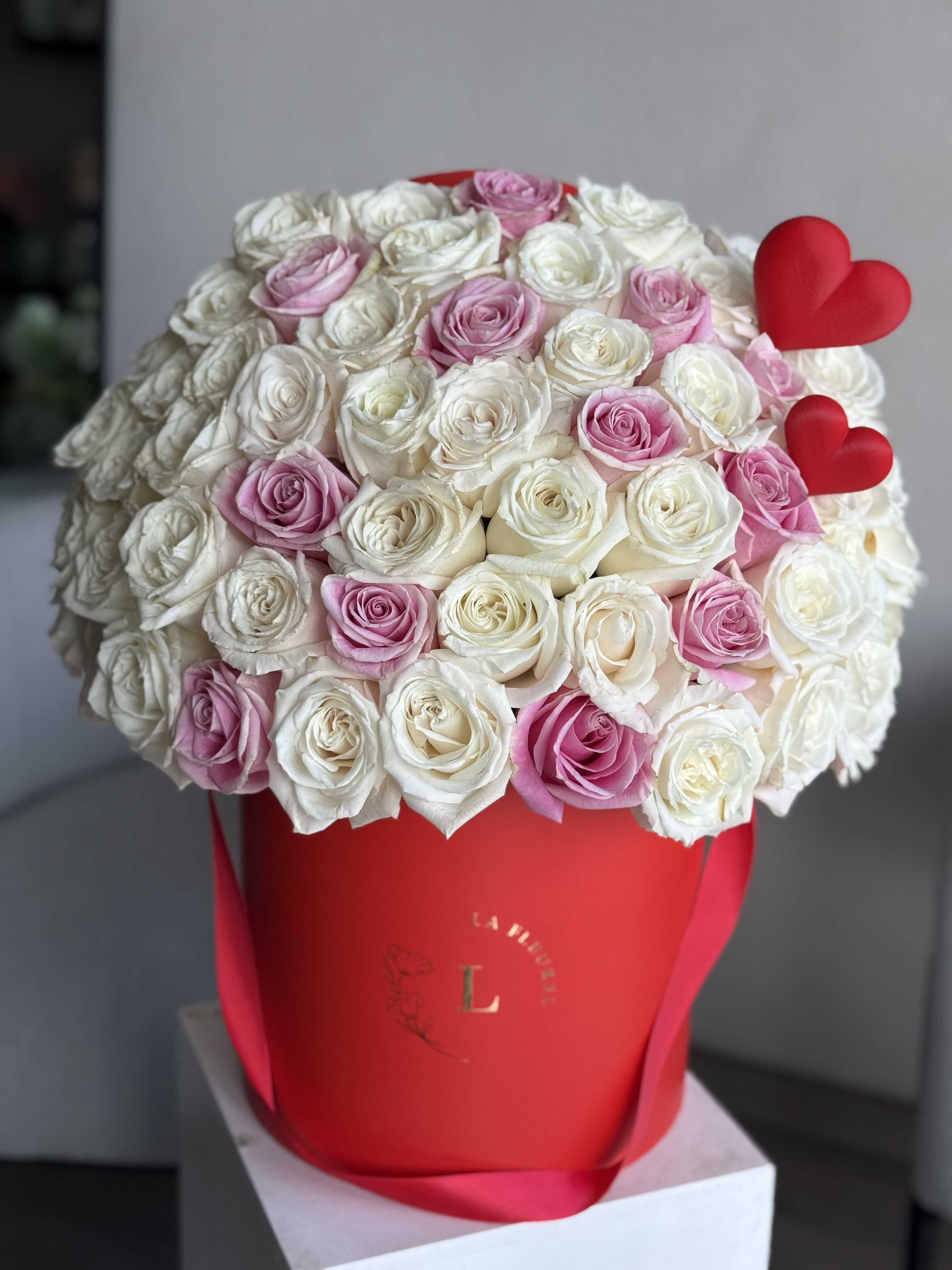 Valentine's 50 Pink and White roses - This beautiful arrangement filled with the white and pink roses to deliver your special message to your special someone. Perfect for any occasion.  Arrangement includes:  Medium box  Card Message