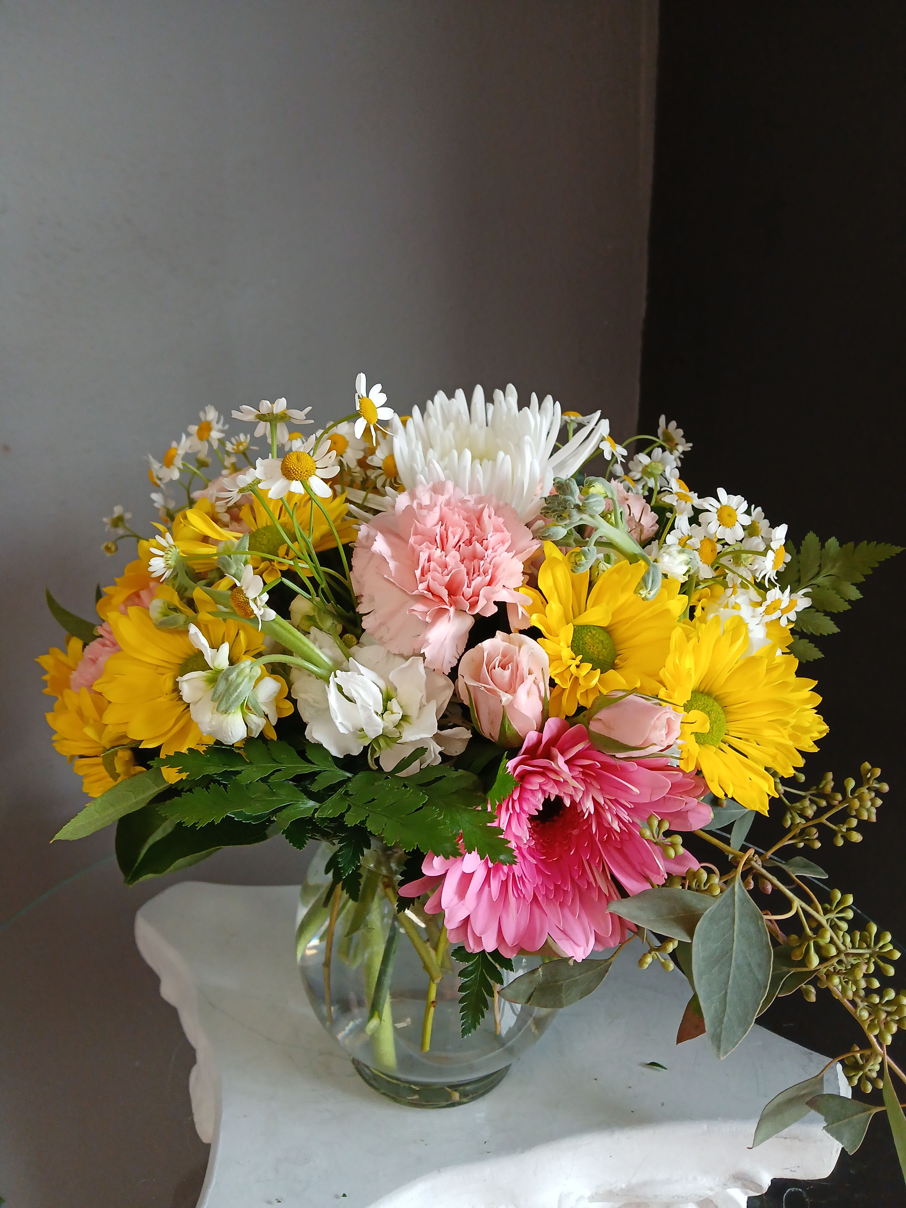 # 101 winter Floral Arrangement - A beautifully winter floral arrangement of the freshest flowers in a vase, uniquely arranged by hand by one of our talented floral designers.