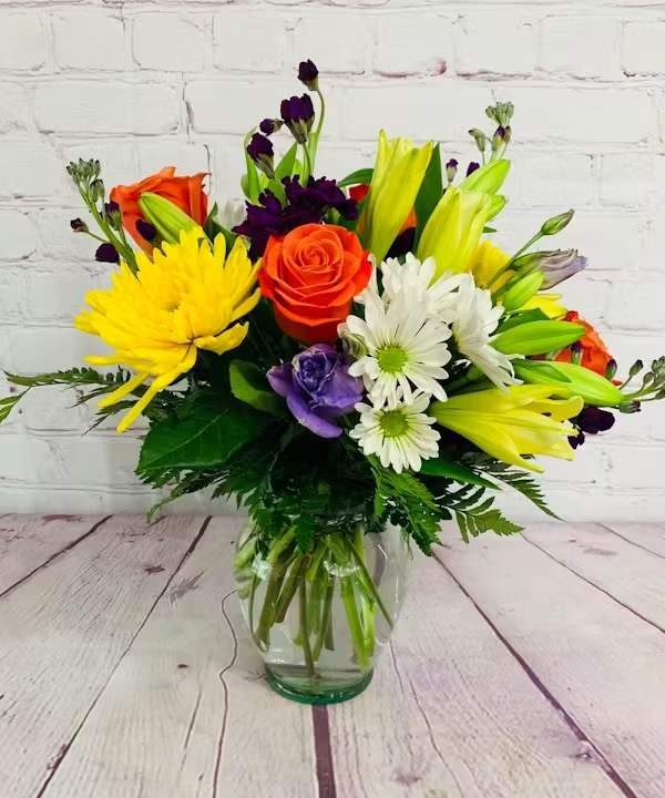 ALL THINGS BRIGHT - All things bright and beautiful are delivered in this vase full of cheerful garden flowers!