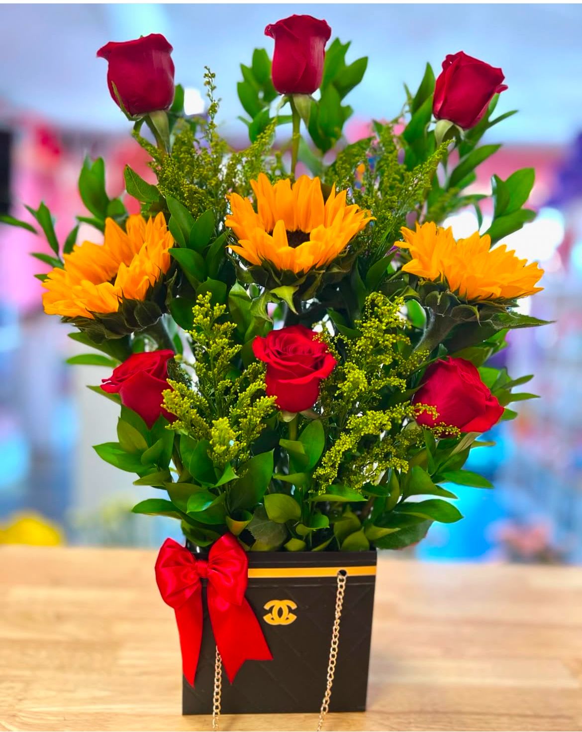 Chanel Basket With Red Roses And Sunflowers –Black  - Buyer will receive a basket with red roses and sunflowers.