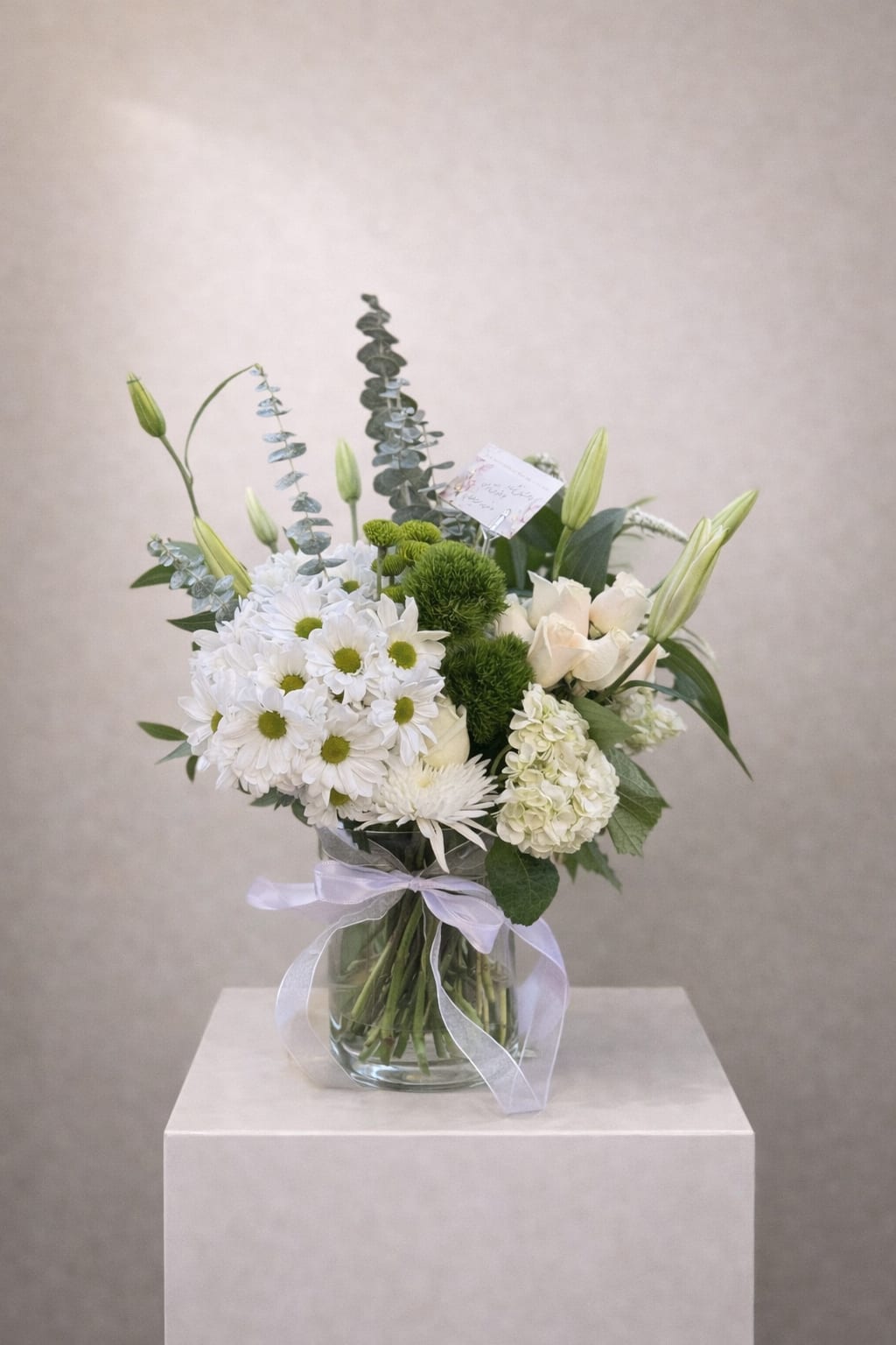 Green Day - Beautiful White and green arrangement in a glass vase 