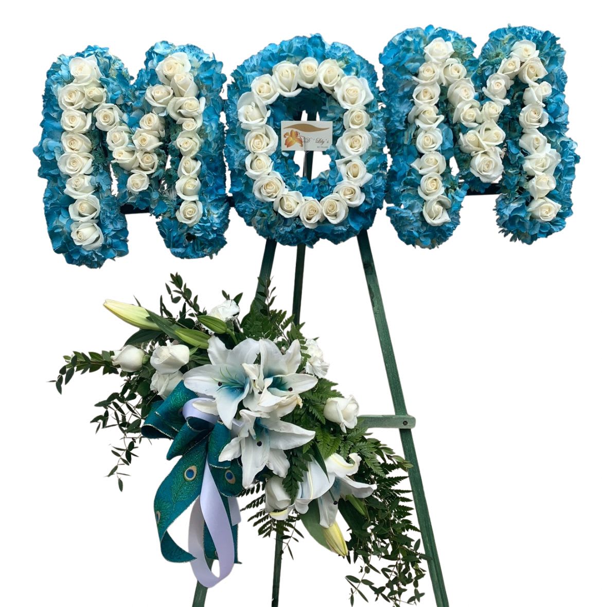 MOM DISPLAY - Beautiful display lettered MOM. DISCLAIMER: FLOWERS MAY BE SUBSTITUTED IF NEEDED.