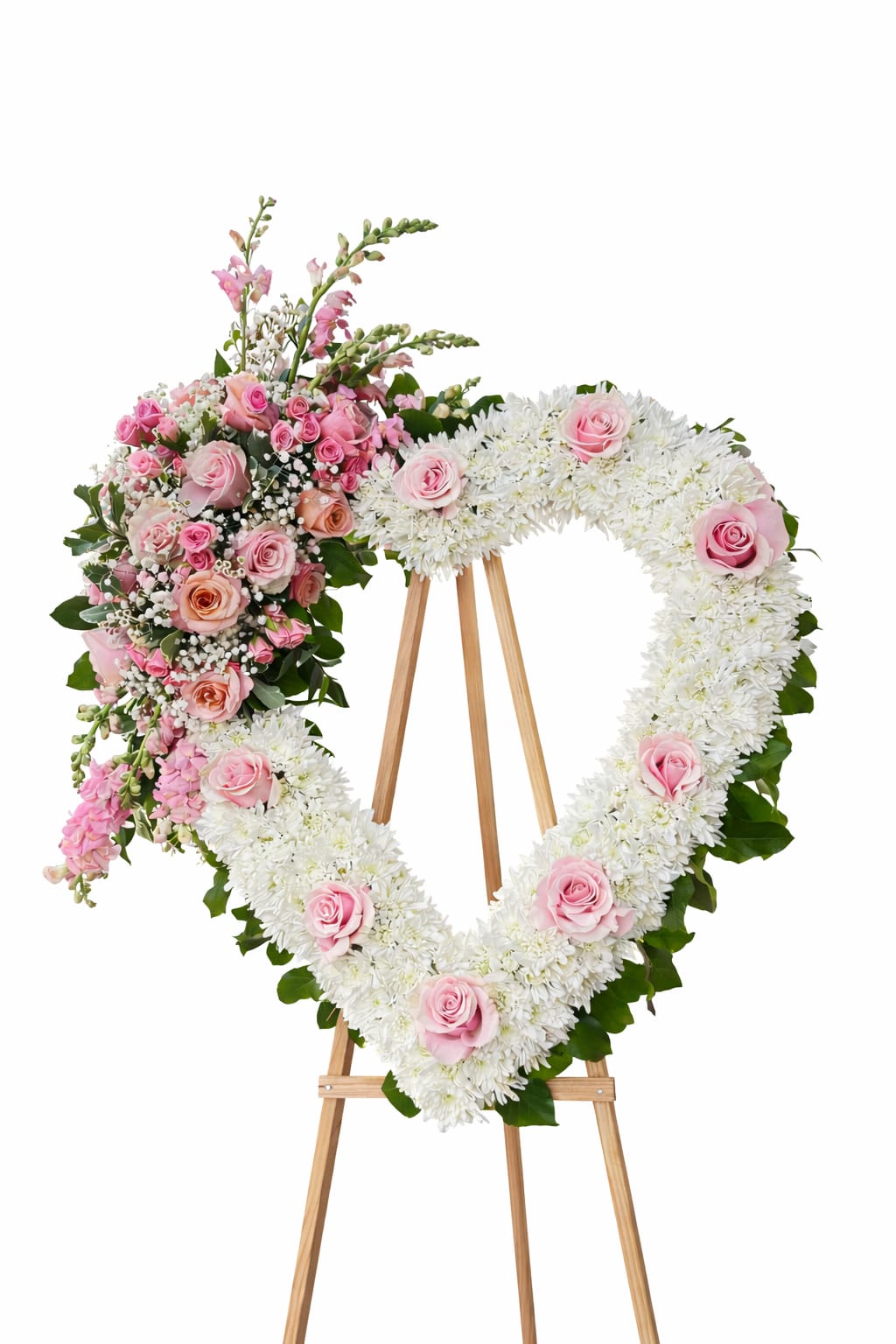 Celeste Heart  - A tender expression if love and remembrance, this heart shaped floral arrangement is a beautiful tribute to a cherished life accented with soft pink roses , lilys or spray roses and carnations symbolize grace, admiration and affection.  