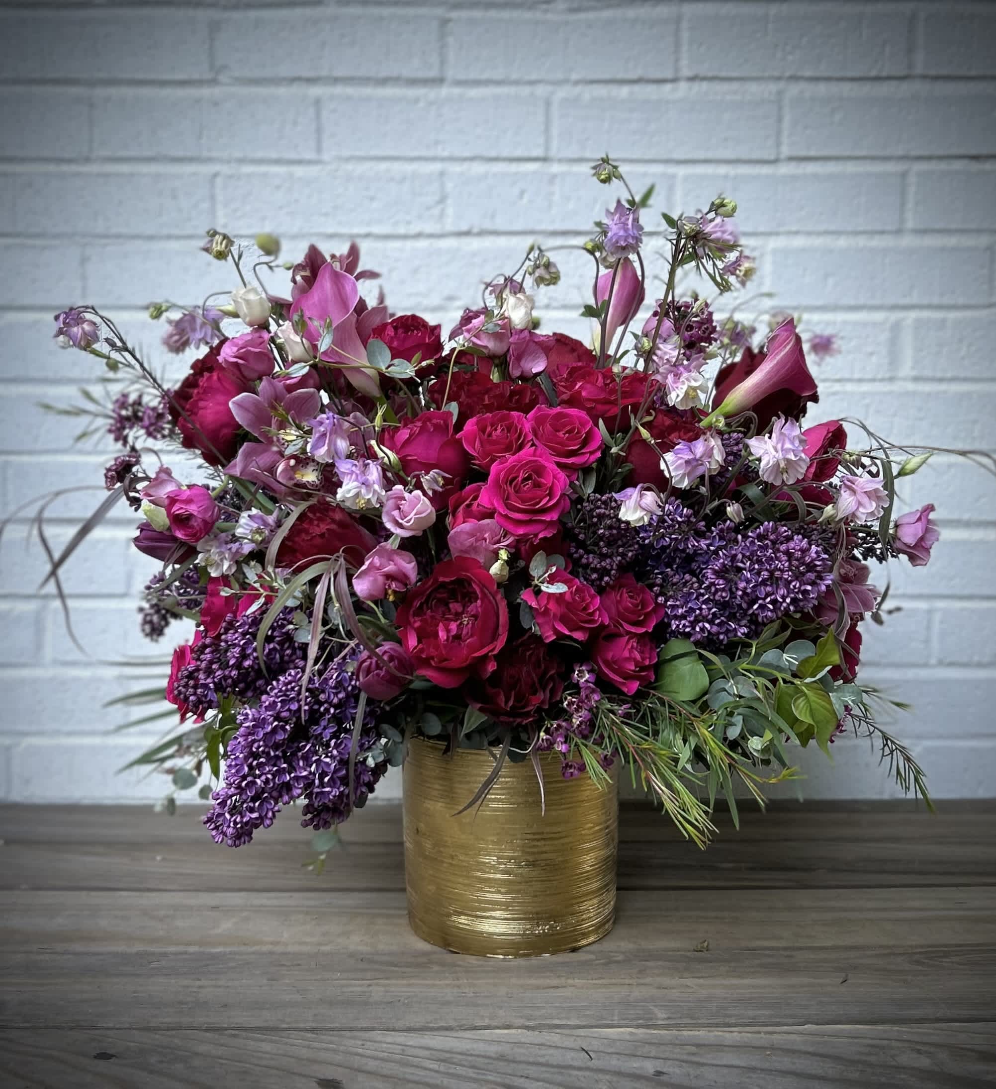 VaVaVoom - Luscious rich romantic colors and blooms gathered in a glamorous vase. Blooms vary seasonally.