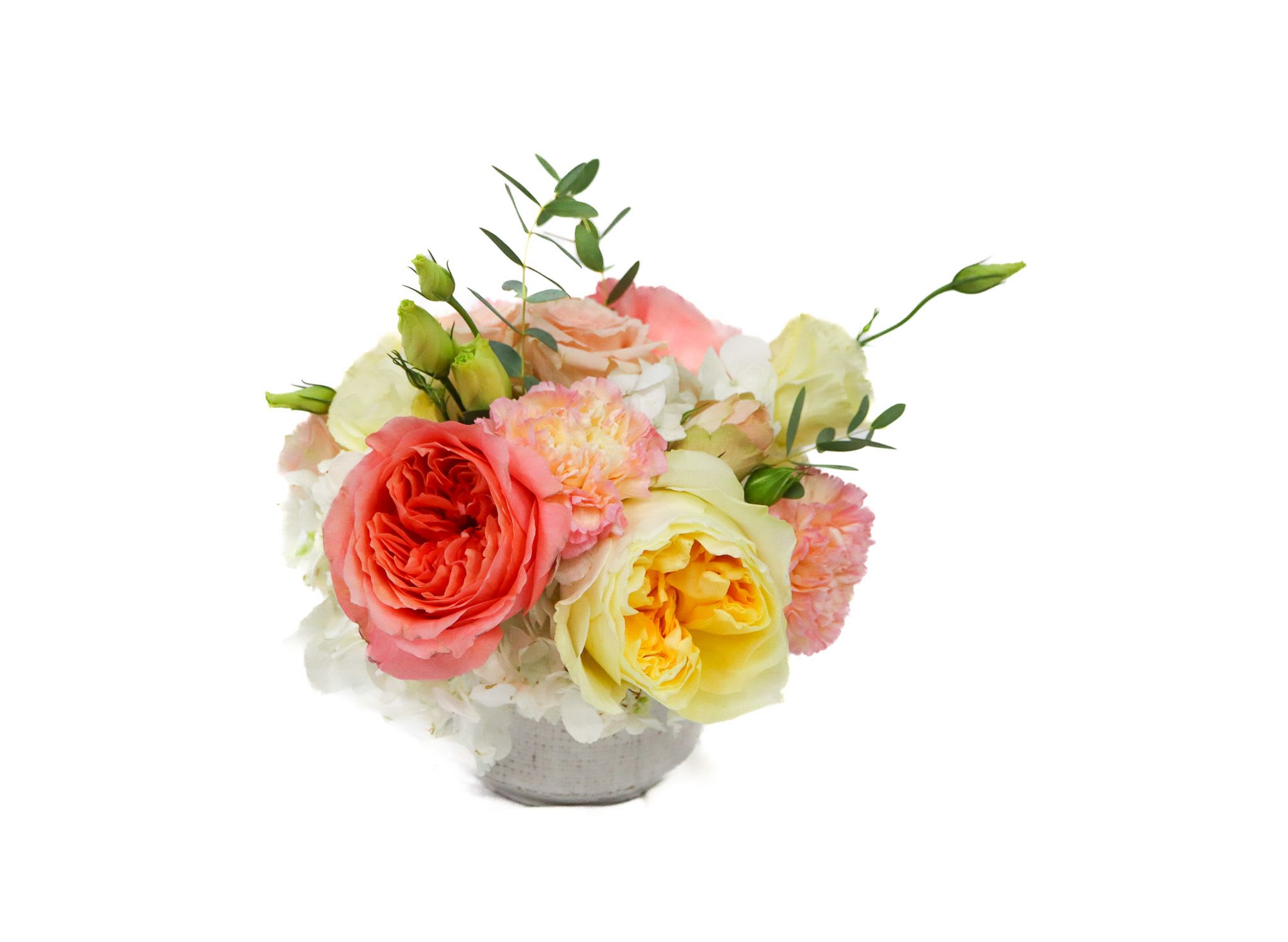 Mini Grace - Delight in the understated elegance of Mini Grace, a petite floral arrangement that embodies timeless beauty and sophistication. This carefully curated bouquet features lush coral and buttery yellow blooms, artfully complemented by delicate greenery. Perfect for intimate celebrations, thoughtful gifts, or adding a touch of grace to any space, Mini Grace radiates charm in every petal.  Whether brightening a cozy nook or expressing heartfelt sentiments, this refined bouquet is designed to impress with its soft hues and elegant composition.