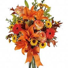 Autumn Glow Bouquet - Autumn Glow Bouquet Celebrate the beauty of fall with this radiant mix of orange lilies, golden roses, red gerberas, and sunny yellow blooms. Accented with autumn foliage and finished with a matching orange ribbon, this arrangement captures the cozy warmth and vibrant colors of the season. Perfect for Thanksgiving gatherings, fall birthdays, or to bring a touch of autumn cheer to any space.