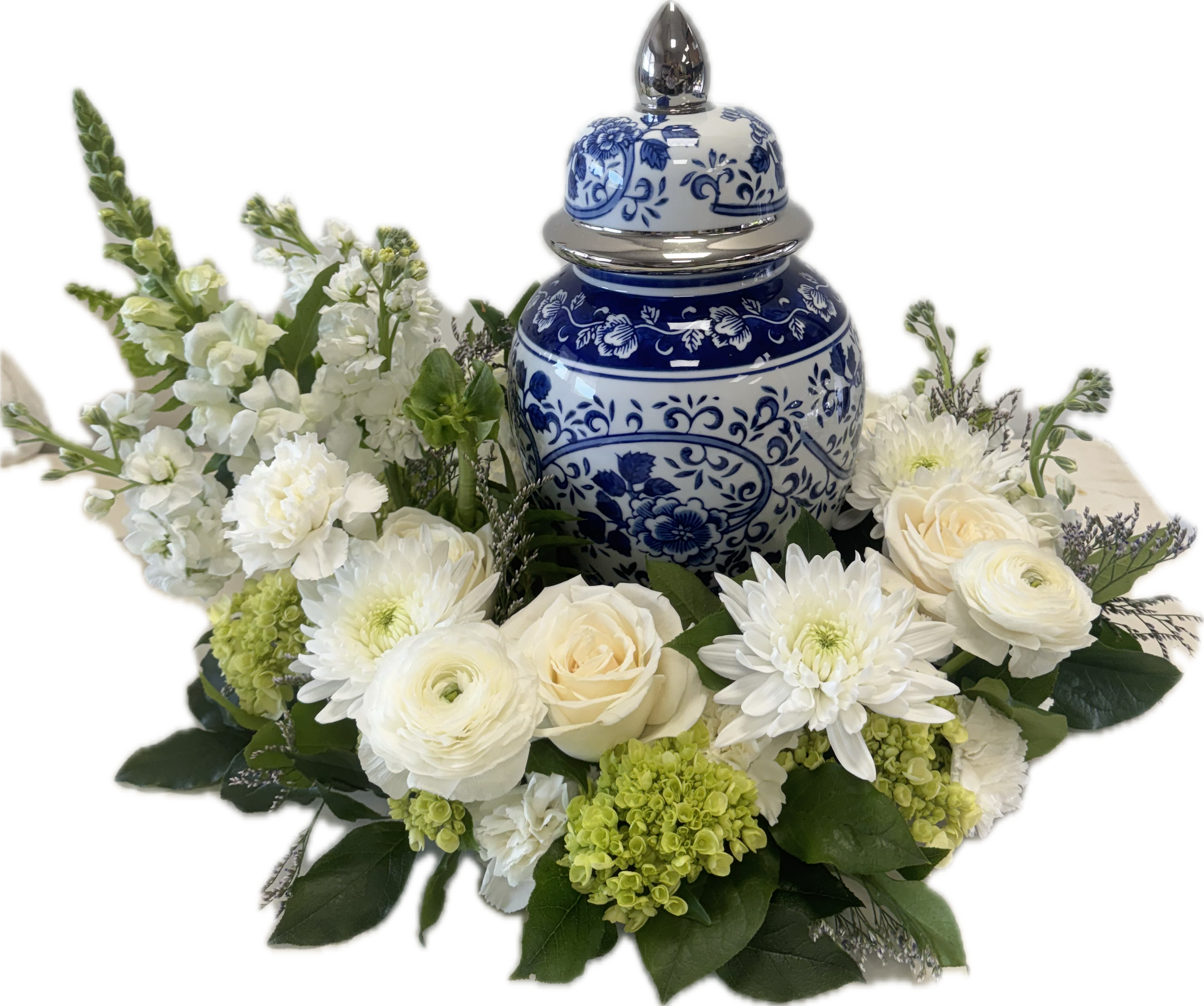 Pure Remembrance Asymmetrical Cremation Wreath - A pure and serene tribute, this wreath arrangement surrounds an urn or cremation box with lush whites and soft greens. With an artistic design flair, its asymmetrical style is perfect to honor someone special. 