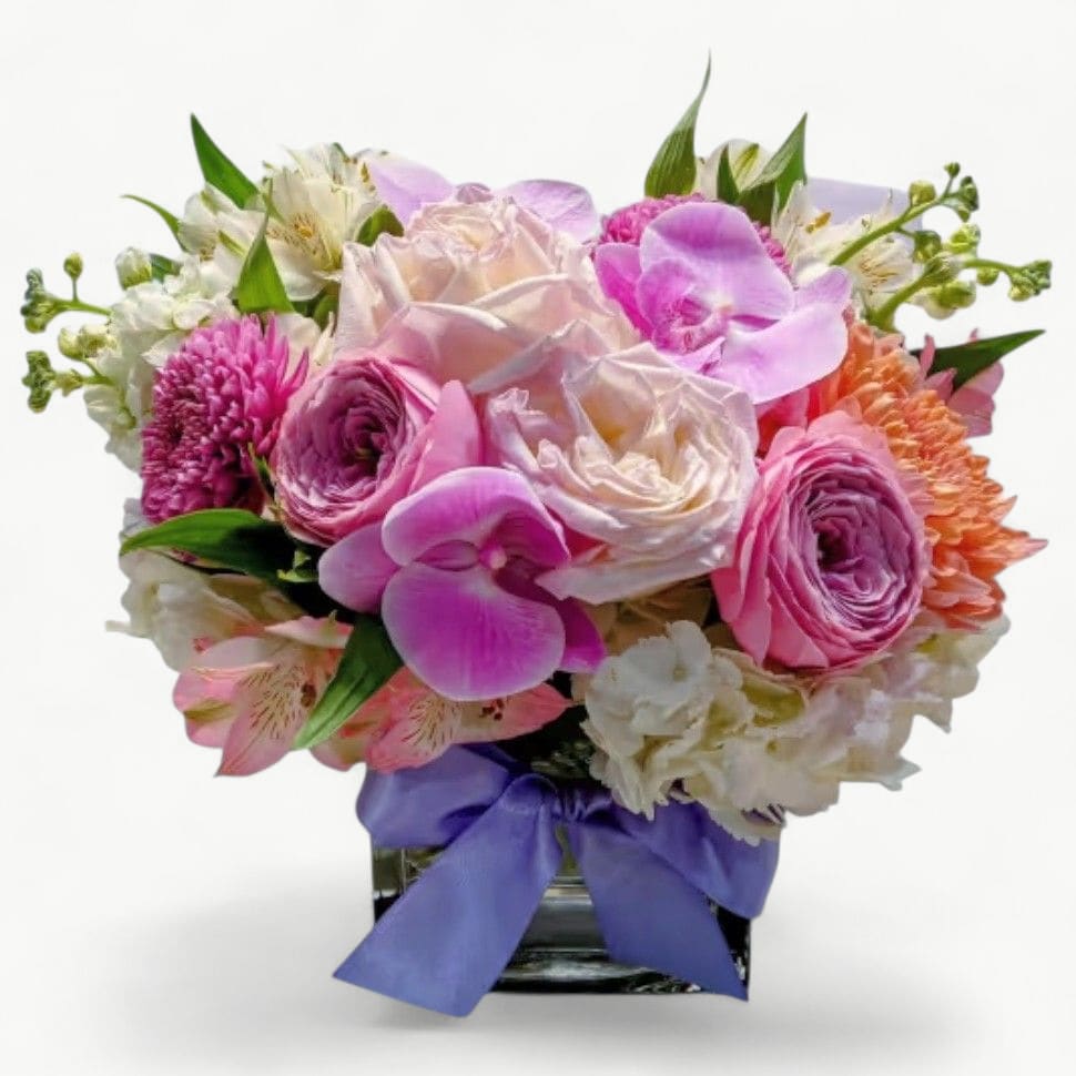 Lavender &amp; Pink Elegance Bouquet - Roses, Hydrangeas &amp; Orchids | Haddonfield &amp; Haddon Township Delivery - Delight them with the Lavender &amp; Pink Elegance Bouquet, a lush blend of roses, orchids, hydrangeas, and seasonal blooms arranged in a chic glass vase accented with a lavender satin bow.  This bouquet is perfect for celebrating birthdays, anniversaries, congratulations, or just because, bringing soft romance and timeless beauty to any occasion. Handcrafted with care by Joey-Lynn's Flowers, each arrangement is designed to be extra special and one-of-a-kind.  Available for same-day flower delivery in Haddonfield, Haddon Township, Cherry Hill, Marlton, and nearby towns. Send elegance, beauty, and love today.