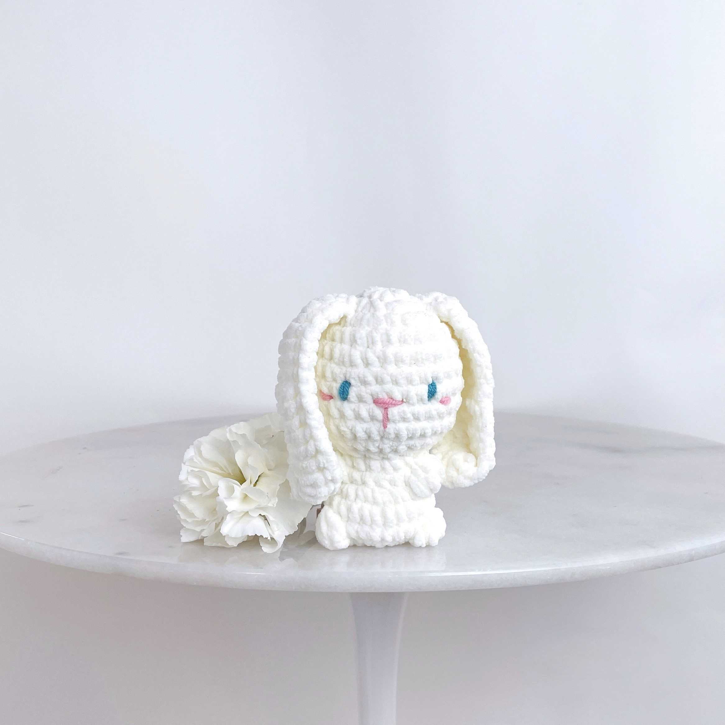Crocheted Bunny Baby - Add an adorable tiny crocheted bunny (5" tall) to any order to add a little something cuddly for your recipient!    Carefully crafted with 100% natural cotton, each bunny is handmade by a women-owned, LGBTQ+ shop in the US.