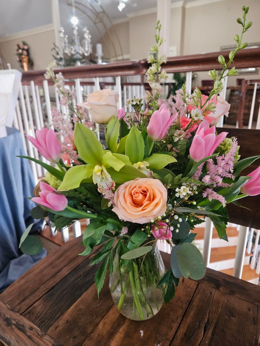 Dutch Delight Bouquet - Dutch tulips, cymbidium orchids, lisianthis, roses, hydrangea, astilble and fillers arranged in a glass vase