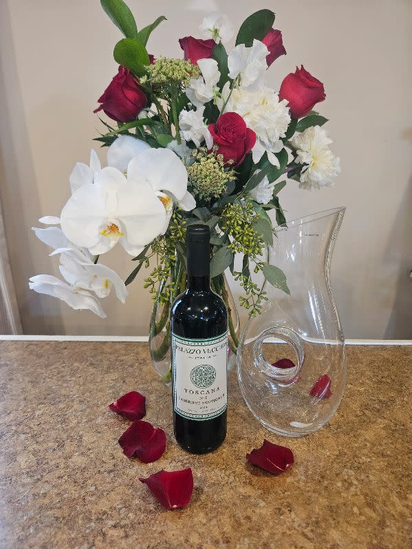  A Tuscan Love Bouquet - Made in a keepsake wine decanter handmade from Poland with a bottle of Toscana Cabernet Sauvignon from Italy.
