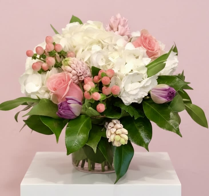 Pastel Designers Choice - Trust our designers to create their magic with the prettiest pastel flowers in our cooler. This photo is just an example of what they can do! Exact flowers will vary