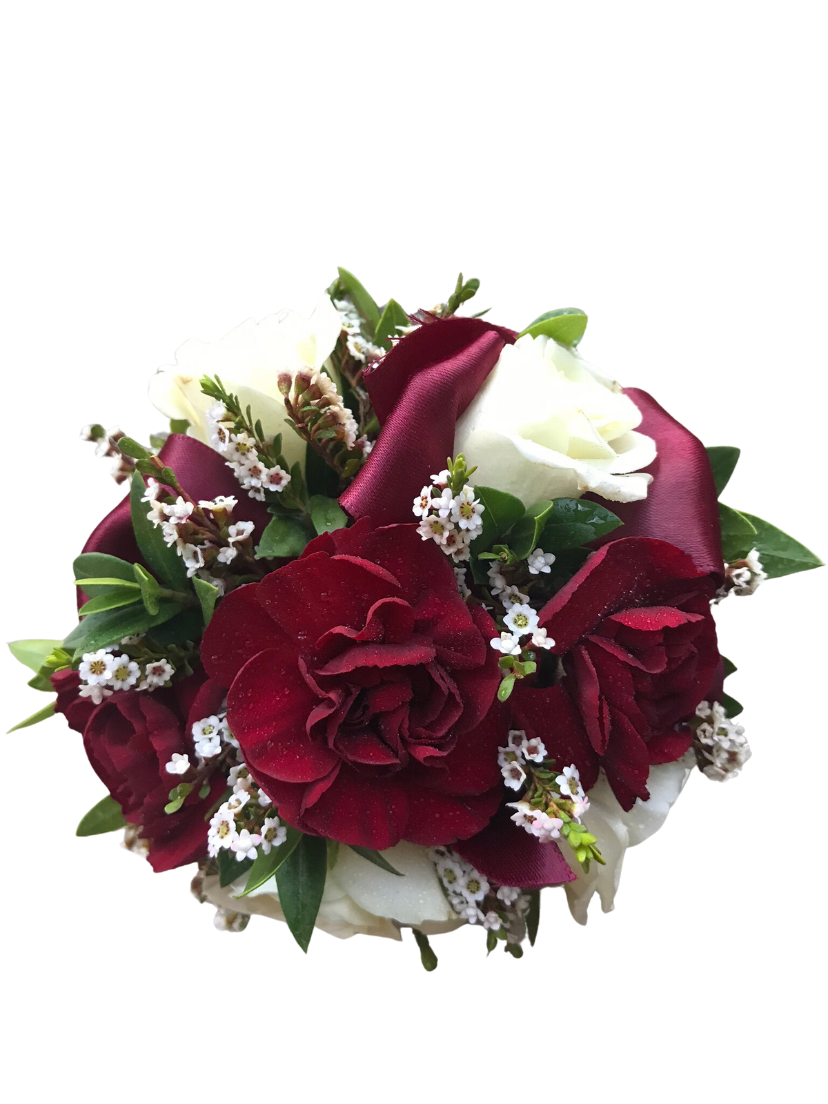 Burgundy and White Wrist Corsage - Mixture of burgundy pixie carnations, white spray roses, greenery and filler flower with burgundy ribbon and pearl bracelet. Greenery and filler may vary based on season and availability.