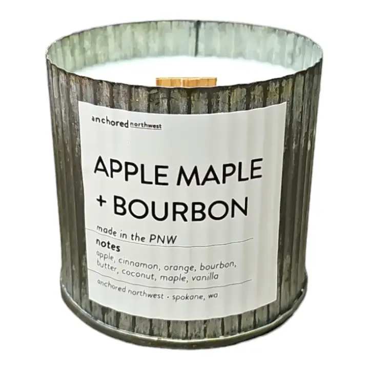 Anchored Northwest - Apples &amp; Maple Bourbon Candle - About this product  Apples &amp; Maple Bourbon Wood Wick Rustic Farmhouse Soy Candle (60 hour burn)  Notes: Citrus, Cinnamon, Chrysanthemum, Apple, Berry, Green Leaves, Pecan, Cedar  Our #1 selling candle container.  *Testers are not available for this container due their high popularity.  Ingredients: 10 ounces poured in a Rustic Vintage container Untreated Cedar Wood Wick 100% Soy Wax grown in the US. Fragrance and Essential Oil Blend Dye and Phthalate free  Anchored Northwest soy wax candles are a great gift for any season, be it Spring, Summer, Fall or Winter. A perfect addition to any home decor.  Our wood wick, triple scented, 100% soy wax candles are hand poured in Spokane, WA. We use real ingredients in our candles - fragrance oils infused with essential oils, 100% American-grown soy wax, and untreated cedar wood wicks.