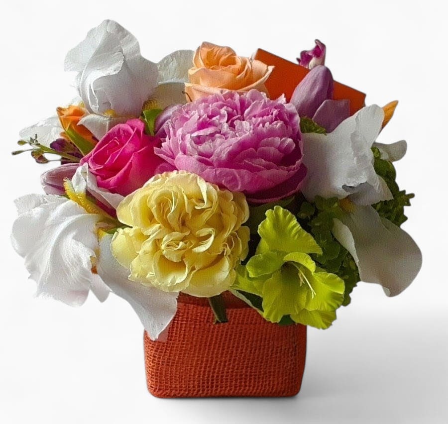 Think Of You Cheerful Blossoms Beauty Designer's Choice - Lovely roses orchids and more arranged in a modern glass cube vase. Perfect for ever occasion to show them how much you care. All fresh flower bouquets that leave my flower shop studio are beautiful works of art made special each time. Send them happiness.