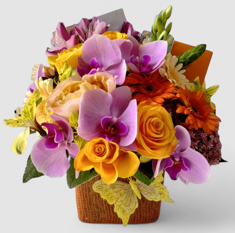 Apricot Lavender Blossoms Designer's Choice - Send this pretty bouquet today to show them how much you care with it's lovely mixed blush and lavender blossoms of the day arranged in a modern glass cube vase wrapped in pretty blush jute ribbon. Always made extra special and unique each time. Send happiness.