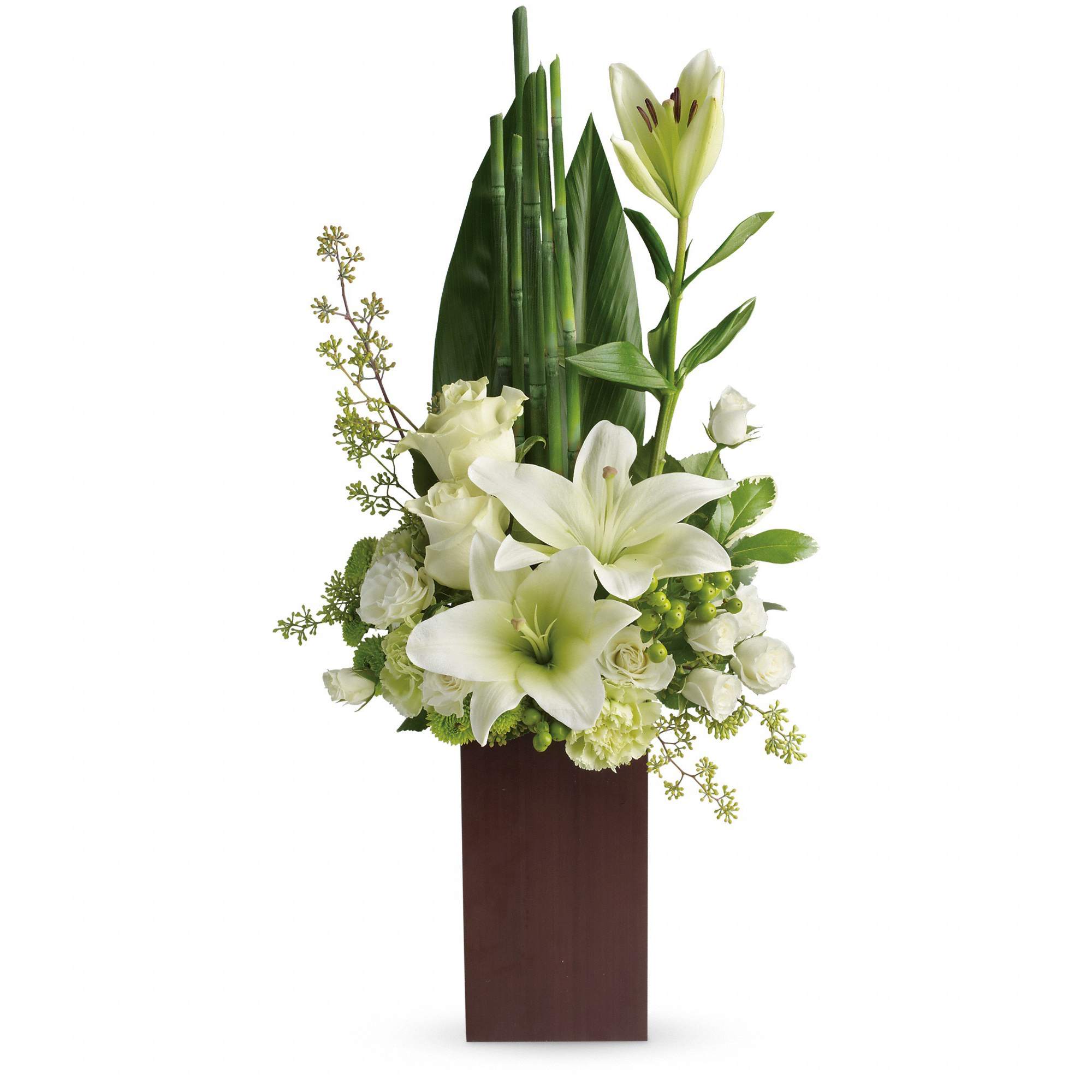 Peace And Harmony Bouquet - Send zen. Pure white blooms and fresh tropical greens combine to stunning effect in this stylish arrangement. Presented in a contemporary bamboo vase they'll enjoy for years to come. 