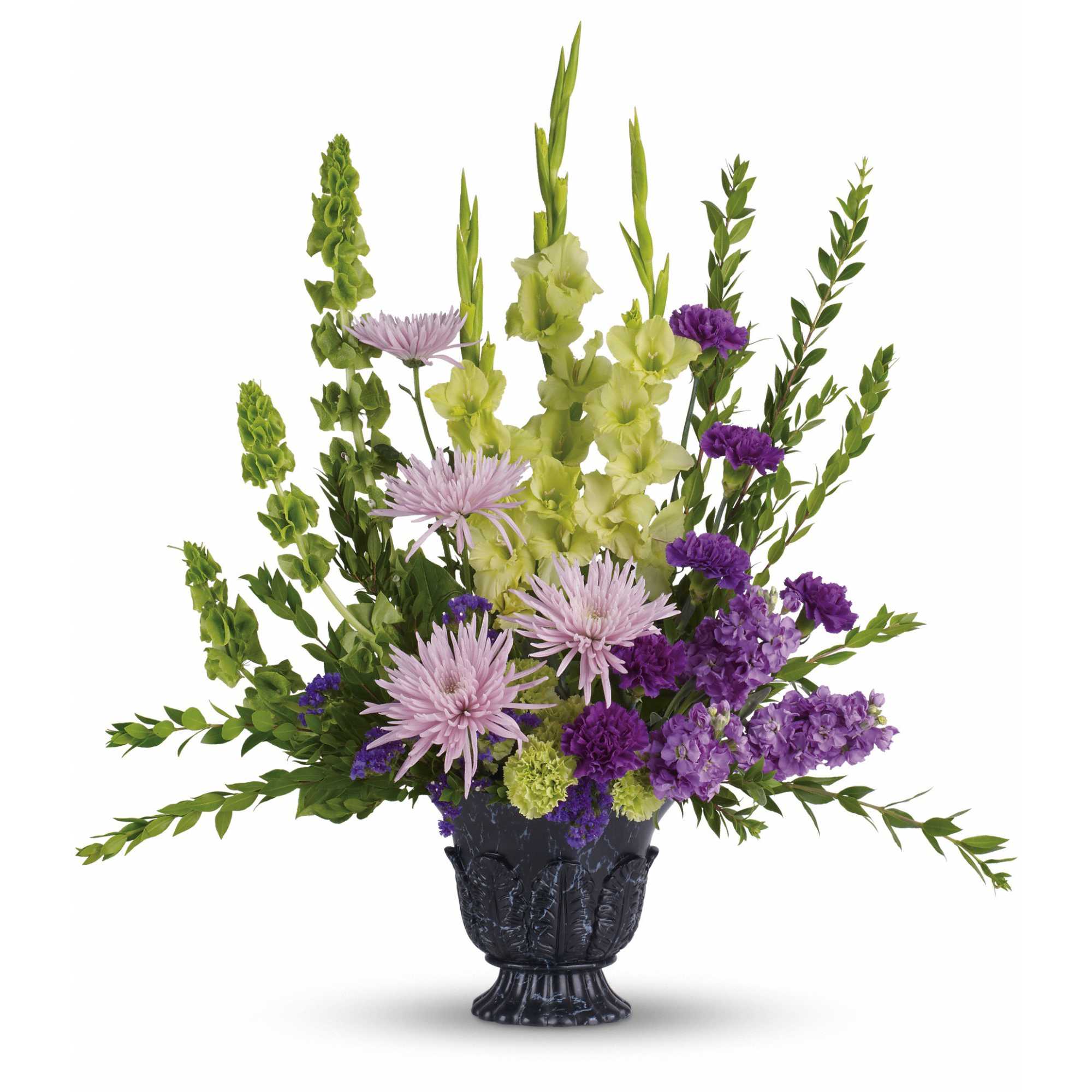 Cherished Memories  - This ethereally lovely bouquet of green gladioli, lavender stock, purple carnations and more in a timeless-tribute urn is a stunning choice for the memorial service. 