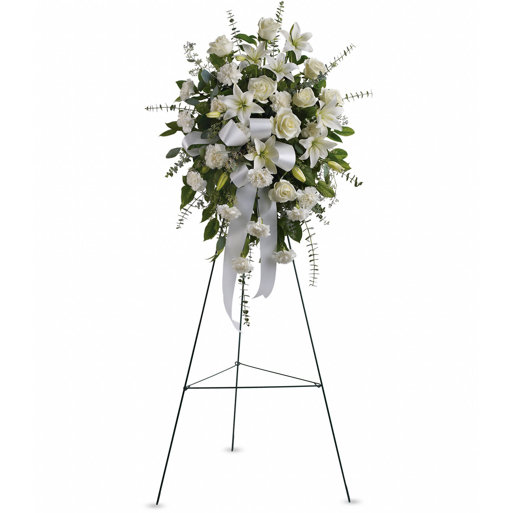 Sentiments of Serenity Spray - Beautifully simple, this lovely spray of white roses, lilies and carnations decorated with white satin ribbon is a tasteful way to express your sympathy. 