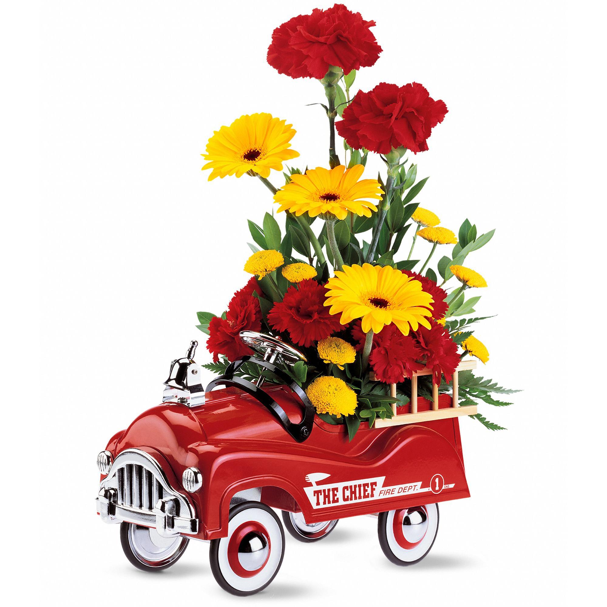Fire Engine Bouquet - Make him feel like a kid again with bright flowers in a blazing red metal fire engine, complete with rubber-tired wheels that roll. 