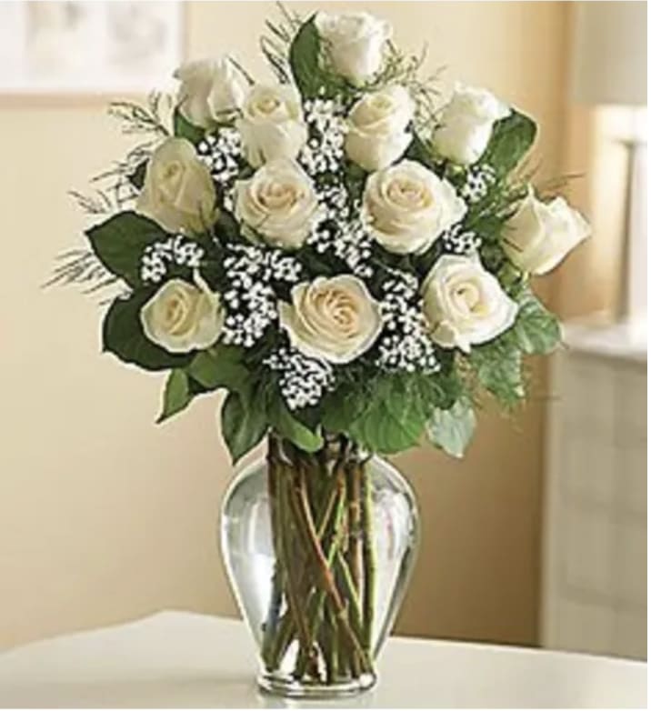 White Roses - A dozen gorgeous white roses are the perfect romantic gift to send to the one who's always on your mind and in your heart. 