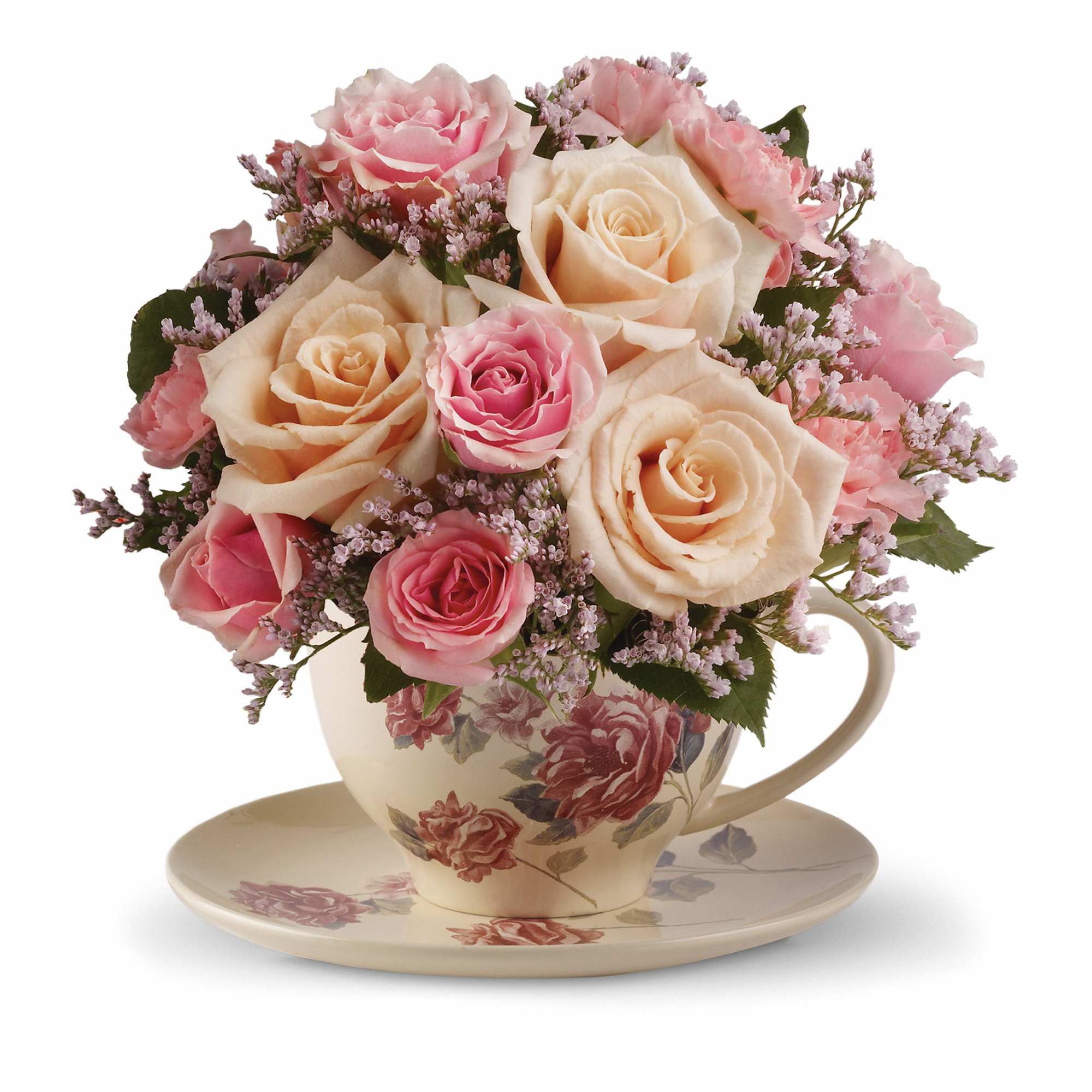 Victorian Teacup Bouquet - Send warm wishes with this lovely gift bouquet that arrives in a ceramic teacup. This charming, old-fashioned bouquet features pink and crÃ¨me roses. 