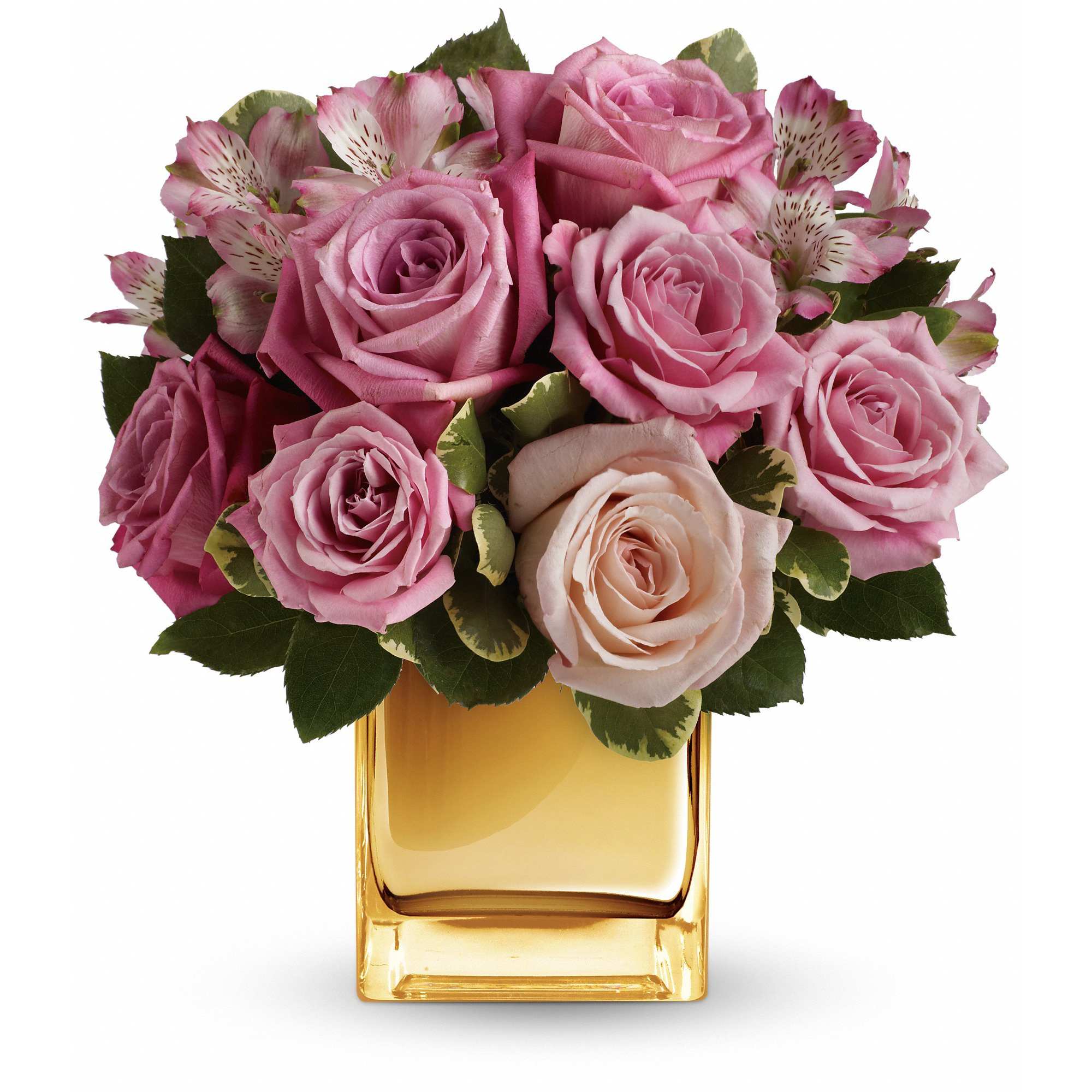 A Radiant Romance - Ravishing roses and a radiant cube vase combine to stunning effect in this amazing arrangement featuring soft, romantic shades of pink and lavender. It's sure to make her heart radiate with love and affection!