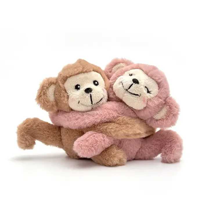 Magnetic Cuddling Monkeys Keychain - Stay close, even when you're apart! These cuddling monkey keychains are a tiny symbol of your love that you can carry anywhere. Each monkey is made to find its match, with magnetic hands and feet that interlock with its partner. Keep one with you and give the other to your favorite person, so a little piece of them is always in reach.