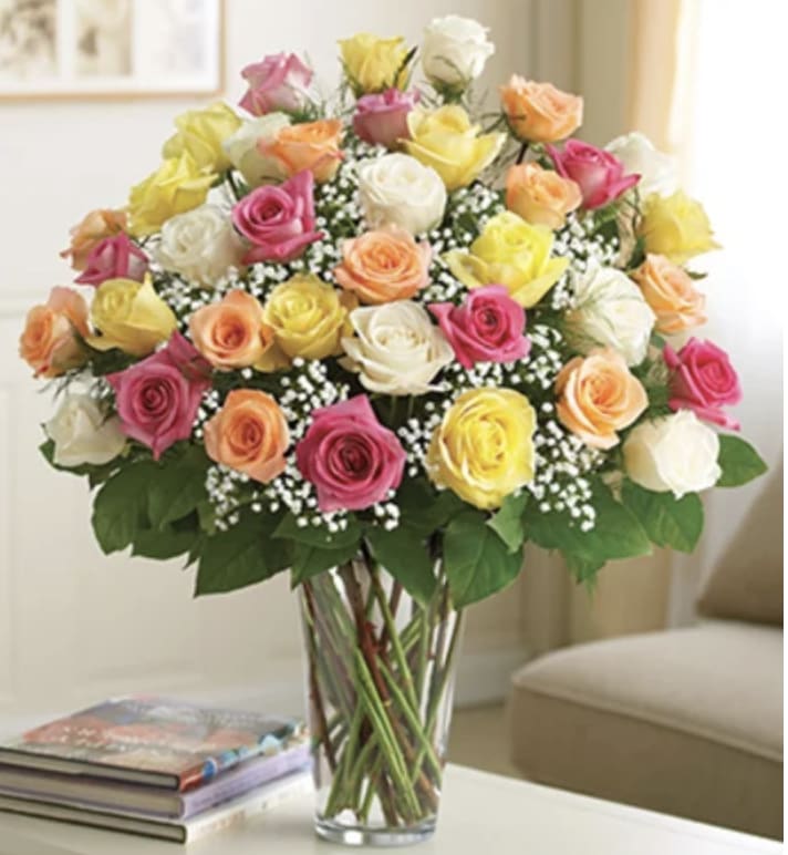 Three Dozen Mixed Roses - Three dozen gorgeous mixed roses are the perfect romantic gift to send to the one who's always on your mind and in your heart. 