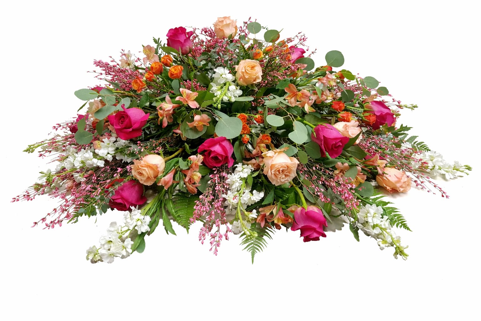 Blushing Garden Tribute - Soft, romantic, and full of grace, Blushing Garden Tribute features rich pink and peach roses accented with delicate white blooms, airy pink textures, and lush greenery. This beautifully flowing arrangement offers warmth and comfort, making it a meaningful choice for honoring a loved one or expressing heartfelt sympathy.