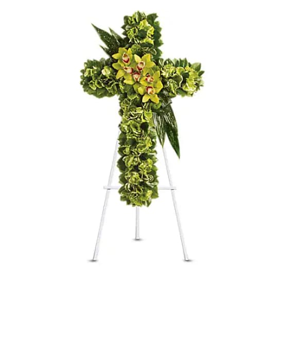 Heaven's Comfort - "A life-affirming gift of faith and hope is always appreciated in a family's darkest hours. This elegant cross delivers that message in a way that will touch many hearts. Green hydrangea along with a dazzling mix of exotic green flowers and leaves create a beautiful and textured cross, delivered on an easel.   Orientation : One-Sided  All prices in USD ($)  Standard  T247-1A"