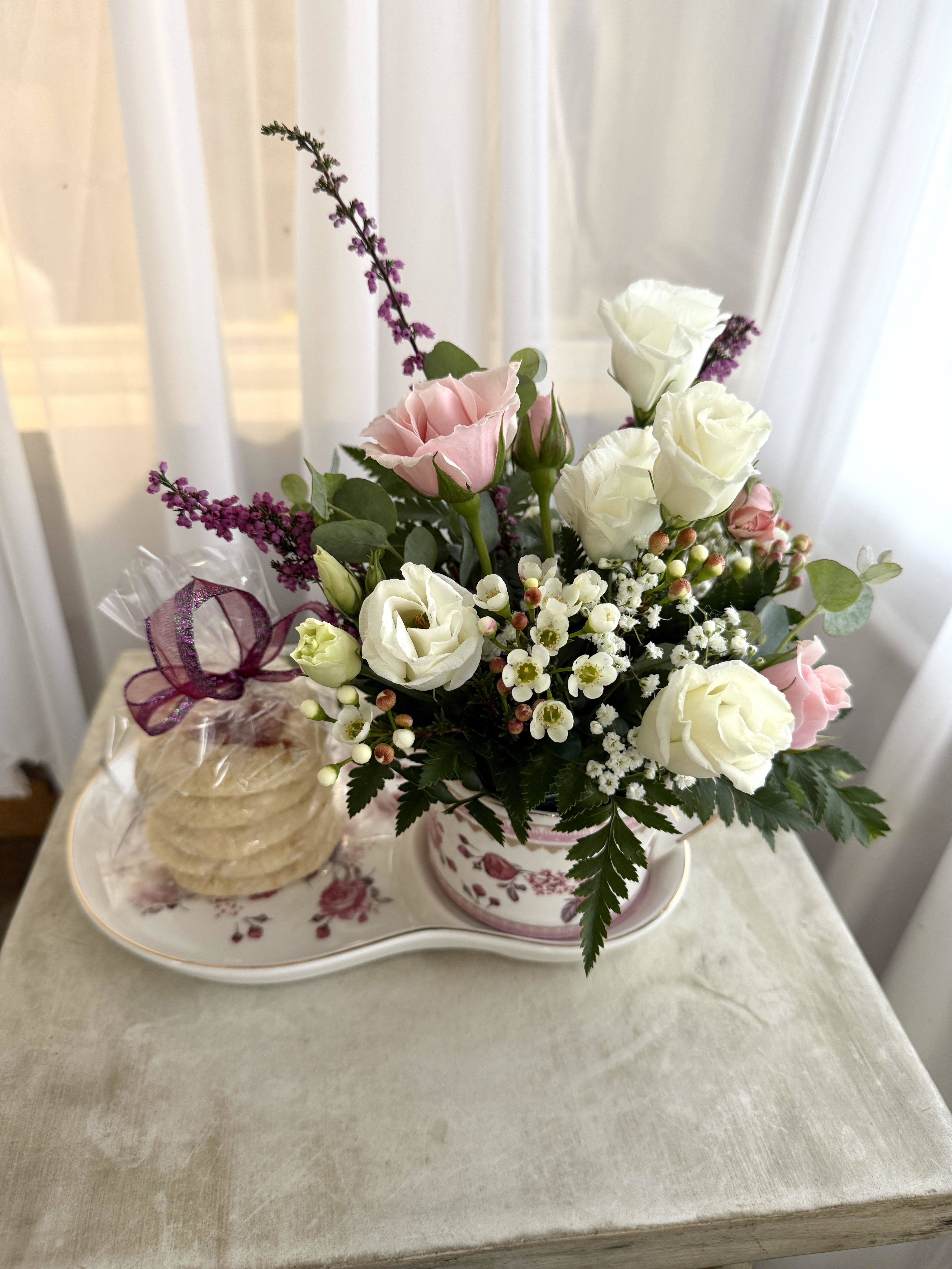 Cookies and Tea - An adorable snack tray is filled with a teacup arrangement AND a bag of 5 strawberry jam thumbprints.