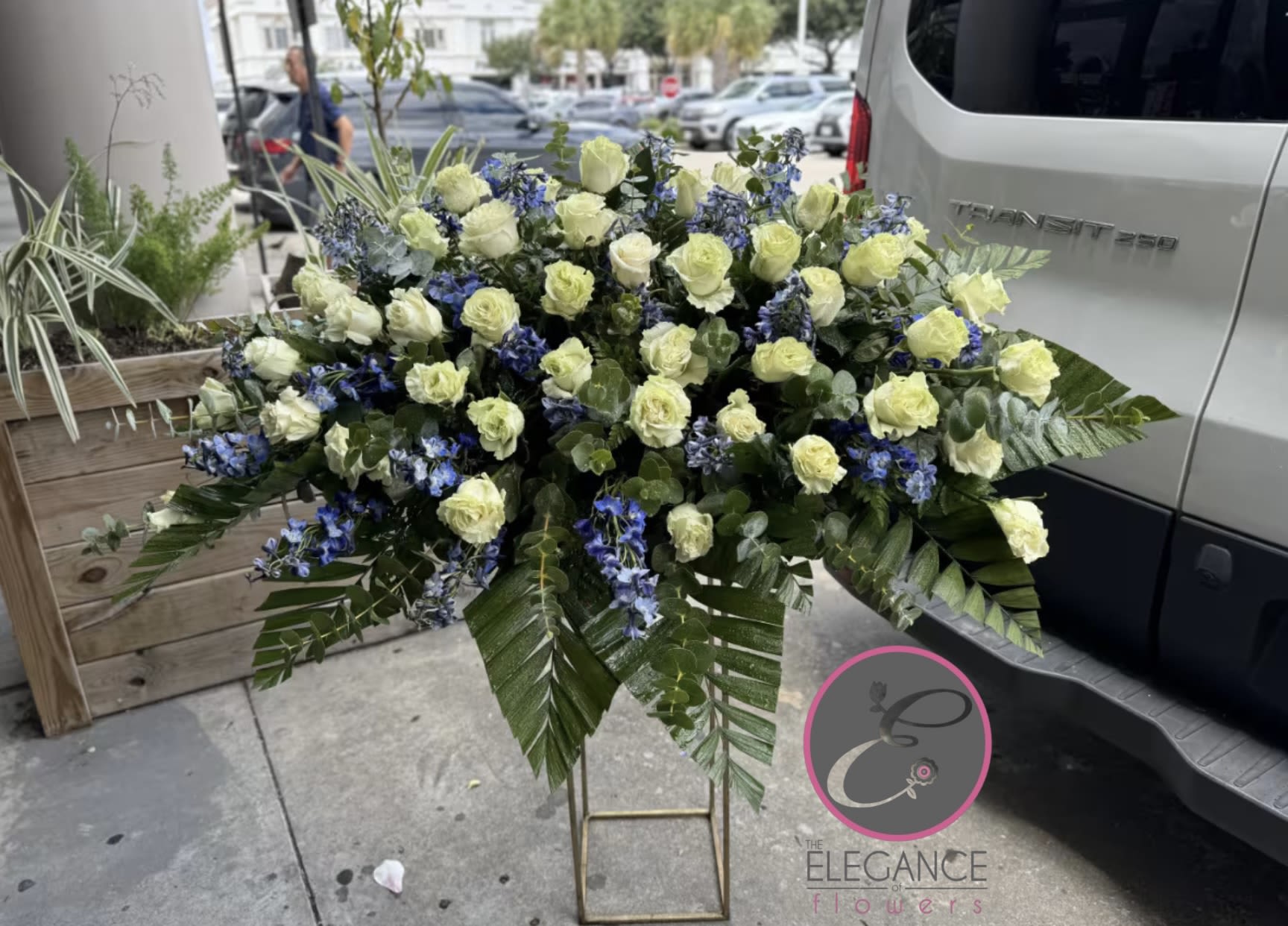 Casket Spray #1 - A casket spray is a beautiful and meaningful floral arrangement designed to adorn the top of a casket during a funeral service. These arrangements typically feature a mix of fresh flowers, like roses, lilies, and carnations, symbolizing love, peace, and remembrance. Casket sprays can be tailored in colors and styles to honor the personality and memory of the deceased, offering a final tribute that brings comfort to loved ones.