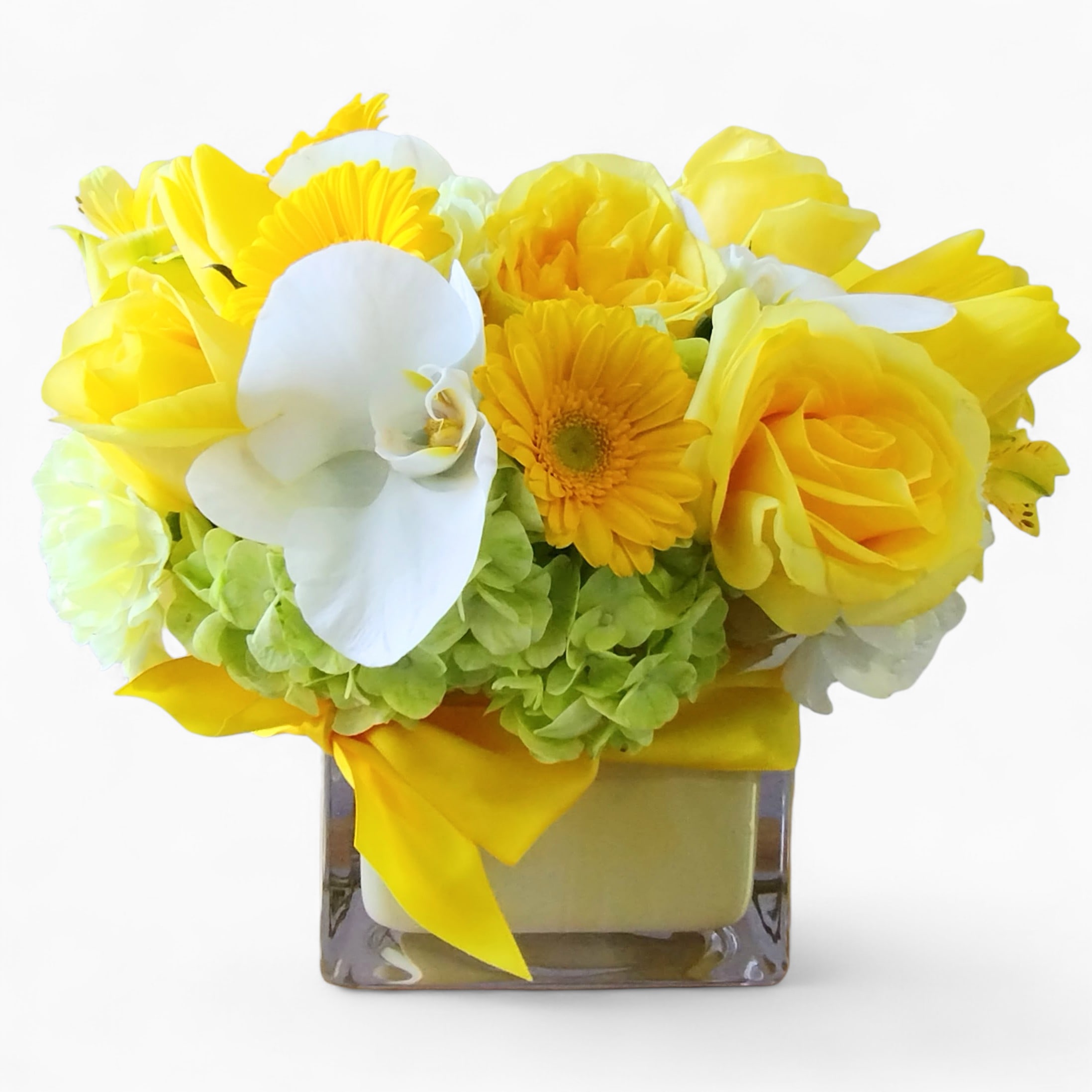 Soft Yellow And Vanilla Blossoms Beautiful Bouquet Designer's Choice - Perfect for every occasion. Send this beautiful bouquet today to show them how much you care with it's beautiful yellow and white blossoms of that day roses orchids and more arranged in a modern glass cube vase wrapped in cheerful yellow jute ribbon. All flower arrangements that leave my studio are beautiful works of art made with lots of care and are unique each time. Please visit my beautiful gallery to see my latest designs that I have created for my online customers. Send them happiness. Send them a special bouquet to make them smile today.