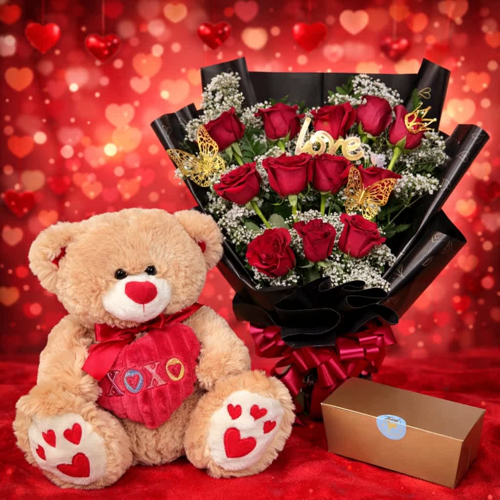XOXO Sweetheart Bundle - Say “I love you” in the sweetest way with our XOXO Sweetheart Bundle—a timeless Valentine’s Day gift designed to melt hearts. This romantic bundle features a stunning bouquet of 12 fresh red roses, elegantly wrapped and accented with delicate details, paired with a 14" adorable plush teddy bear holding an XOXO heart and a box of 12 premium chocolates for the perfect finishing touch.  Whether you’re celebrating Valentine’s Day, an anniversary, or a just-because moment, this bundle delivers romance, sweetness, and unforgettable smiles—all in one beautiful gift.   Want to make it even more special? You can enhance this gift by adding a Valentine’s Day balloon, available in our Valentine’s Day section, for an extra festive and romantic touch.
