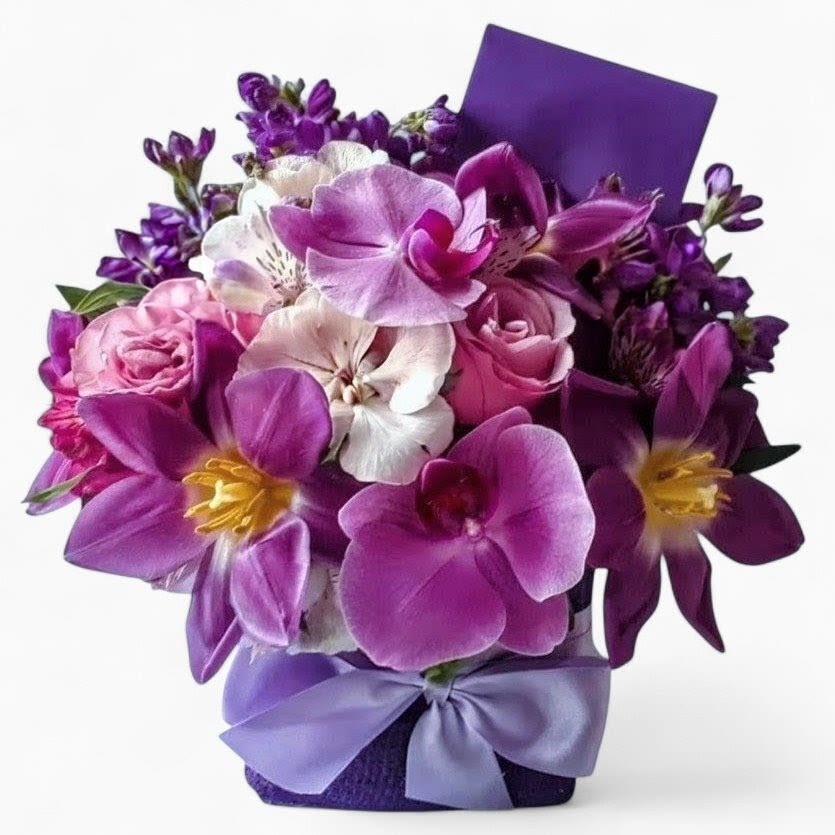 Violet Blossoms Orchid Happy Birthday Beautiful Bouquet Designer's Choice  - Made unique and different each time from my beautiful violet blossom selection of that day roses orchids and more arranged in a modern glass cube vase wrapped in beautiful violet jute ribbon. Perfect to send for every occasion to show them how much you care. All fresh flower bouquets that leave my flower shop studio are beautiful one of a kind works of art made special each time. Send happiness.